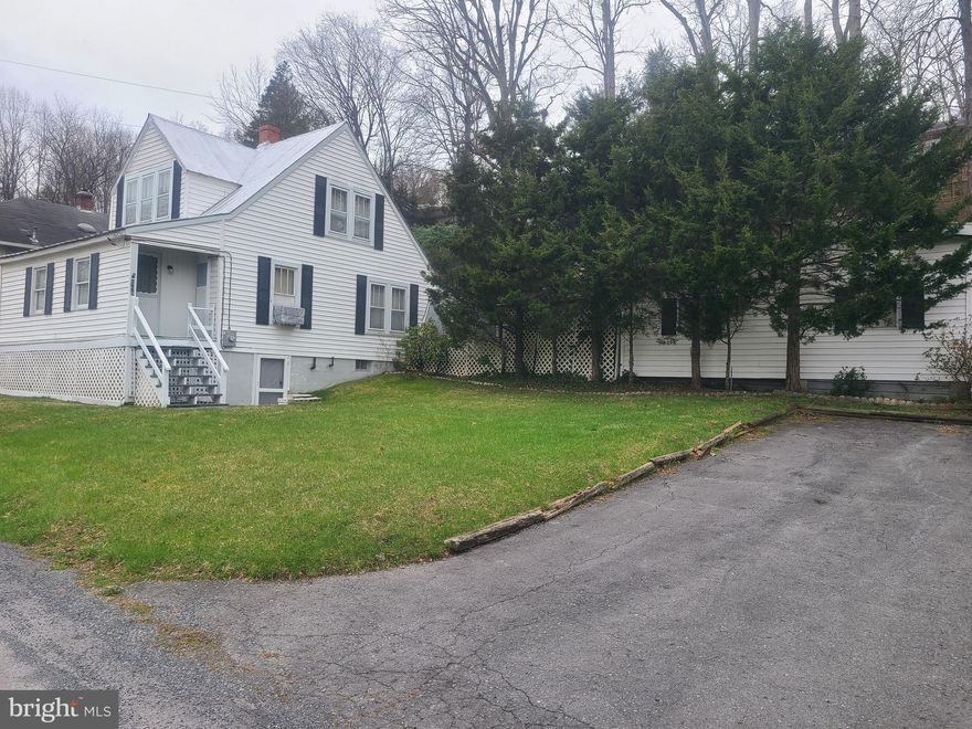 Home needs TLC especially the basement, but could be a great rental or first time home. 2 BR & 1 Bath up.  Main level has 1 Bath also.  Close to downtown Berkeley Springs.  Selling As Is. No Repairs