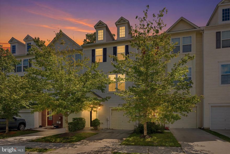 Just Listed! This beautifully maintained, spacious 3-level townhome in Woodland Park at Wildewood offers over 2,000 sq ft of comfortable living space with 4 bedrooms and 3.5 baths. Situated on one of the best lots in the neighborhood and one of the few townhomes backing to trees, enjoy peace, privacy, and gorgeous nature views from your deck while relaxing or dining outdoors. The entry level features a fully finished bedroom or rec room with an attached full bath, perfect for guests, a home office, or flex space. Upstairs, a bright open floor plan awaits with a spacious family room and an eat-in kitchen featuring a huge center island, abundant cabinetry, and bar seating, making it ideal for hosting and entertaining. The upper level offers a spacious primary suite with wooded views, a walk-in closet, and attached full bath, along with two additional generously sized bedrooms, a full hall bath, and convenient upper-level washer and dryer. Community amenities include a pool, playgrounds, picnic areas, and walking/jogging paths, all conveniently located near shopping, restaurants, PAX River, and commuter routes.
