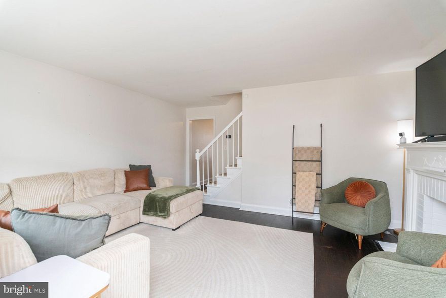 Charming and move-in ready, this rowhome in East Baltimore’s Belair-Edison neighborhood offers comfort, character, and an excellent opportunity to step into homeownership.

The main level features a spacious living room with an ornate mantle, a separate dining space, and a gourmet kitchen with stainless steel appliances and access to a balcony that's perfect for morning coffee or evening relaxation.

Upstairs offers two comfortable bedrooms and an updated full bath, while the finished basement provides additional living space, a half bath, and flexibility for a home office, gym, or guest area. Enjoy a fenced backyard ideal for entertaining, plus the comfort of central AC.

Conveniently located near local parks, shops, and commuter routes, this home combines charm with modern updates in one of Baltimore’s classic neighborhoods.