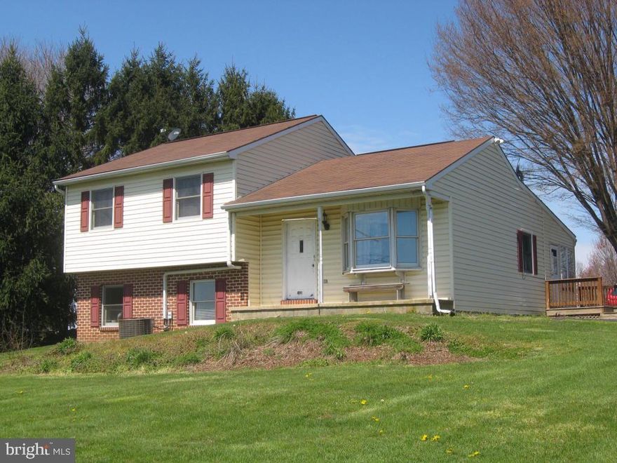 Nice split level in Manor Twp. just outside of Millersville. Kitchen open to living room (currently used as formal dining room.   Enjoy the enclosed porch, large deck and  pond for outdoor entertaining.