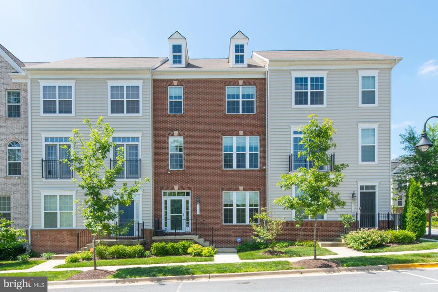 Brick front/ almost new large town home, just few minutes walk from the Morgan Blvd Metro Station (Blue/Silver Line).  4 bedrooms, 3 1/2 baths, detached 2 car garage, gourmet kitchen w/ granite and stainless appliances, large master suite, double sinks, neutral colors throughout, bright, ope floor plan, high ceilings.  Short walk to Fed Ex Field.  Easy commute to DC, Navy Yard, etc.  Welcome Home!