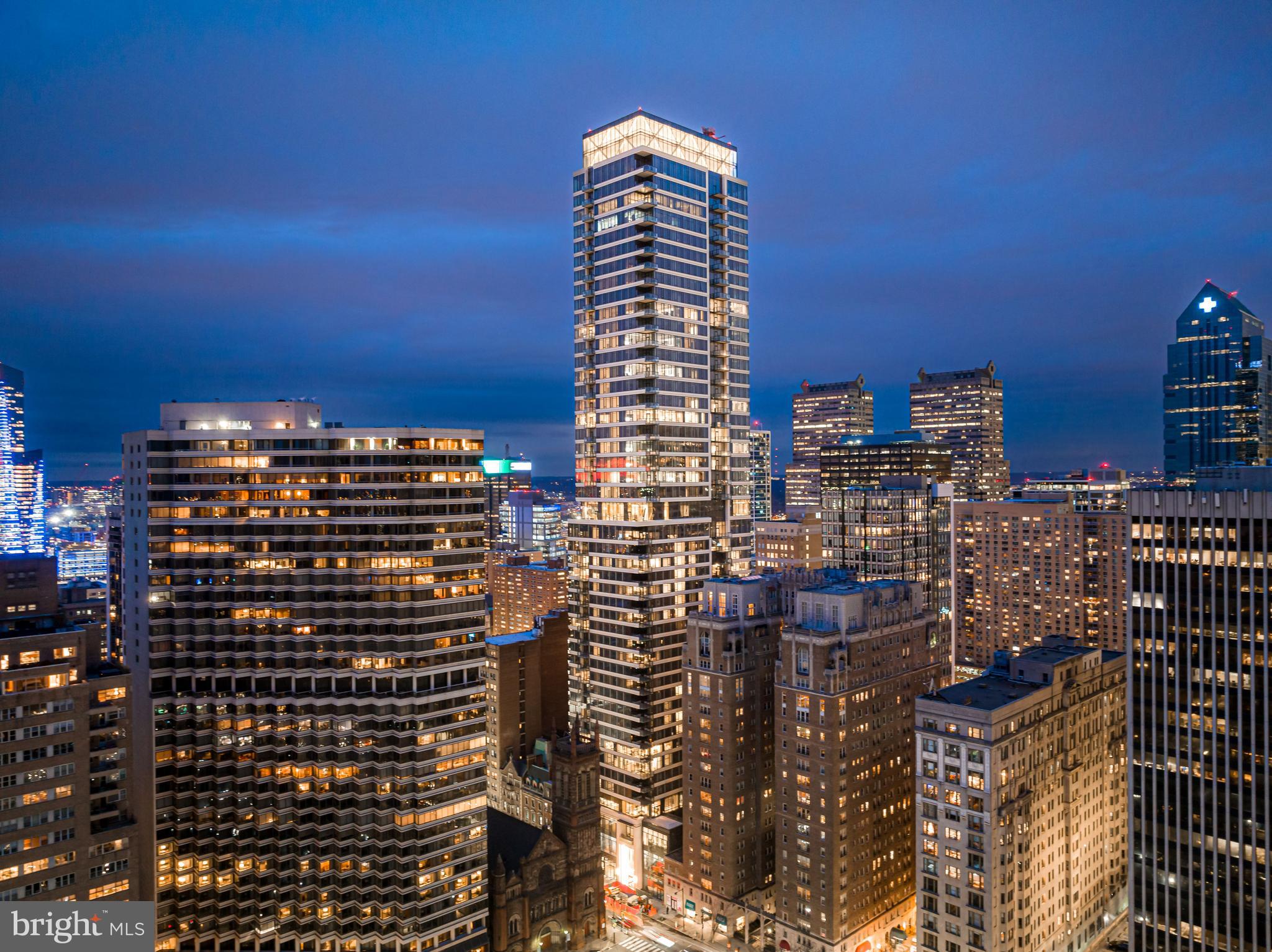 Welcome to The Laurel. Named for Pennsylvania s state flower, The Laurel introduces a lifestyle worthy of this final residential opportunity on prestigious Rittenhouse Square. With hotel-like amenities included for all owners, we offer the carefree enjoyment of city living. The meticulously curated array of services and amenities include an indoor and outdoor pool along with a stunning club room and expansive terrace overlooking the Square. Above it All with panoramic vistas of city and sky, we are the tallest all residential building in Philadelphia.
The Sky Residence 1(S1) is a 3 bedroom home located on the South East corner. The location of this unit lends to its own panoramic views throughout, showcasing beautiful sunrises over the Delaware River and sunsets over the Schuylkill River. Over 2400 square feet of luxury awaits you with 134 SF balcony overlooking Rittenhouse Square, this home is sure to WOW ! The open floorplan offers furniture style custom built European kitchen cabinets by Hans Krug in a high gloss white finish. The appliance package includes a Sub-Zero integrated refrigerator, Wolf gas cooktop, state of the art steam oven and full size convection oven. The oversized kitchen island features Quartz counters with waterfall edges, a large under mounted sink, Dornbracht faucet, Signature power steam dishwasher and under-counter drawer microwave. The primary bathroom is complimented by an expansive shower with Fantini shower fixtures. The luxurious freestanding soaking tub sits atop stunning marble floors surrounded by floor to ceiling porcelain walls. A laundry room with full size Maytag washer and vented dryer complete this magnificent residence.