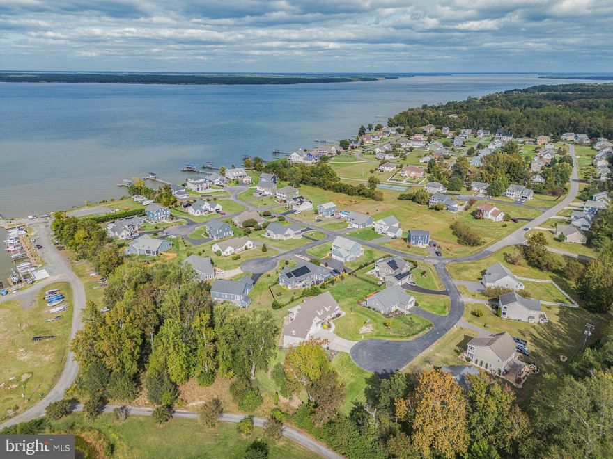 3.375% Assumable Loan, for qualified buyers!!!  Don't miss out on this unique home in the Potomac River  community of Potomac Landing! This 3-bed, 3-bath rambler offers nearly 3,000 sq ft of beautifully finished space on a landscaped cul-de-sac homesite. Nestled on a quiet cul-de-sac, residents enjoy golf-cart access to Tim’s II, Sam’s Pizza, and the full-service marina, plus private access to three sandy beaches and a fishing lake perfect for kayaking or canoeing. Enjoy river-community living at its best!
The residence makes an immediate impression, with its neutral HardiePlank exterior, black shutters and columned front porch. The side-loading garage - freshly painted with
epoxy floors, upgraded lighting and even a mount for a TV - makes for a dream setup
for any car enthusiast or hobbyist! Out back, a brand-new composite deck flows
seamlessly to a stone terrace, perfect for evening gatherings as the backyard slopes
into lush green space beyond.
Step inside, and the light-filled main level instantly feels like home! The open-concept
design highlights gleaming hardwood floors, soft lighting and a spacious living room
framed by large bay windows. The kitchen wows with walnut-toned soft-close cabinetry,
granite counters, a large island and upgraded KitchenAid appliances (all within the last
year). The breakfast nook overlooks the deck and yard, while a nearby laundry area
offers a utility sink, cabinetry and natural light.
The primary suite offers two large windows, a walk-in closet and an ensuite bath
complete with dual vanities, a jetted soaking tub and a walk-in shower. Two additional
upstairs bedrooms and a full bath round out the main level.
Downstairs, the finished basement delivers versatility galore! There’s a carpeted flex
space (possible bedroom!), an expansive entertainment area with a wall-mounted TV
setup and a full bath, among other storage nooks. Downstairs, you’ll find access to that
immaculate garage, too! The home’s systems, including HVAC and hot water heater,
have been regularly serviced.
This is a location that blends leisure and convenience! 
Beyond the homesite, it’s a near straight shot to Downtown Fredericksburg and multiple
I-95 exits/VRE stations, which await 25 minutes west as well as Dahlgren/the US-310
bridge, 20 minutes east. For everyday needs, the Shops at King George are less than
10 minutes south. The home is serviced by King George County Public Schools, with
Sealston Elementary, King George Middle and King George High School as its
designated spots.
In every sense, 6316 Vista Court pairs comfort with community perks and water
proximity. Book your showing ASAP!