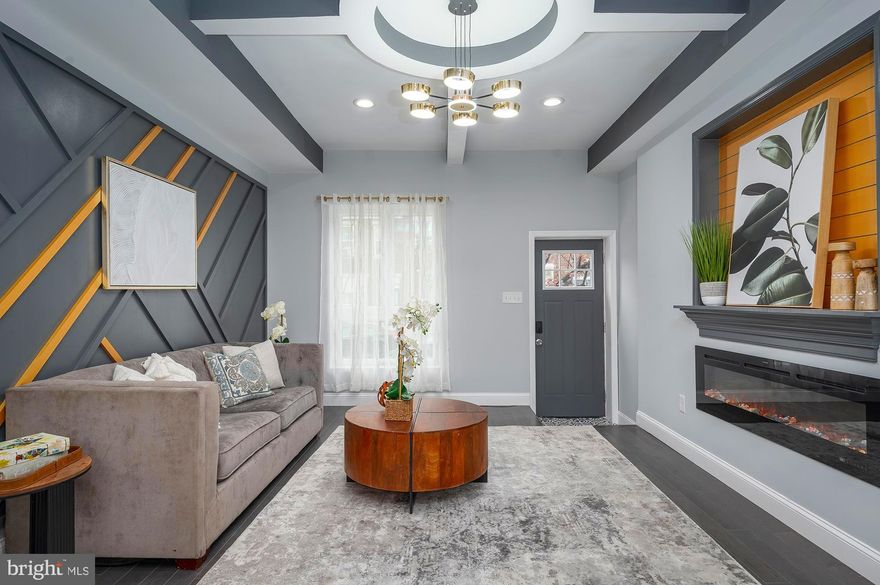 Welcome to 223 N Linwood Ave - fully renovated stylish home with PARKING ready for its new owner. This impeccably designed home has it all. The main level welcomes you with a spacious living room featuring an electric fireplace, state of the art accent wall, solid wood floors throughout, leading you into a large dining area, as well as a gourmet kitchen with timeless classic white shaker cabinets, quarts countertops with a waterfall island and stainless appliances. 

Second floor boasts with to en-suite spacious bedrooms, beautifully designed bathrooms with tastefully selected. Lower finished level is a perfect space for guest quarters and a home office, offering also a full bathroom. Additional perks are brand new mechanical systems - new electric, plumbing and HVAC, and more. Centrally located in Patterson Park, close to Canton, Fells Point, Johns Hopkins, downtown, stadiums and all major highways.