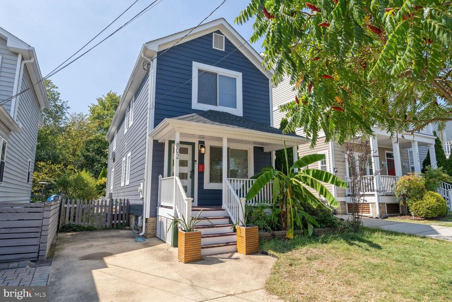 Rare opportunity on a quiet street in Clarendon.  With its inviting curb appeal, deep front porch and beautifully landscaped yard, this property offers a rare opportunity to enjoy the comfort of a detached home in a friendly neighborhood in the heart of Clarendon—one of North Arlington's most desirable areas.  The open layout combines living and dining rooms, and eat-in kitchen.  The spacious family room off the kitchen opens onto a large deck and lush backyard, filled with unique tropical foliage that thrives in the DC climate and returns every year, making it perfect for gatherings and relaxation. Upstairs, the expanded primary suite with a vaulted ceiling includes a versatile attached space which can be used as an office, sitting room, or nursery.  Off the primary bedroom is a peaceful balcony where you can savor your morning coffee or evening glass of wine, while taking in views of one of the prettiest yards in the neighborhood. Upstairs is the second bedroom and second full bath.  The owner has meticulously cared for the home, with recent updates including replacing roofing and shingles in 2023 and newly installed Hardie Plank siding and  gutters in 2021.  The home's driveway provides enough off-street for two SUV’s. Recent updates have been made to the bathrooms, upstairs laundry, staircase and landing.  +++  Beyond the home’s beauty and comfort, you’ll love the unbeatable location—just a short stroll to popular Clarendon attractions like Pottery Barn, the Apple Store, the new Lifetime gym, Starbucks, the just opened Wagamama, Ambar, Seamore’s, and more. If you are not into shopping, simply enjoy the large park on Barton St or simply take a stroll on the tree lined streets. And when you're ready to explore further, simply hop on the Clarendon or Courthouse metro for an easy commute to DC or the suburbs. If you drive to work, this location is ideal!  One traffic light and a left turn and your next stop is DC.  You are also one traffic light away from the Pentagon and Pentagon Row. But, if your workplace is in Tysons Corner or the outer suburbs you’ll enjoy the time savings of the “reverse” commute.  This home is one minute to Route 50, six minutes to I-66 and 5 minutes to the GW Parkway.