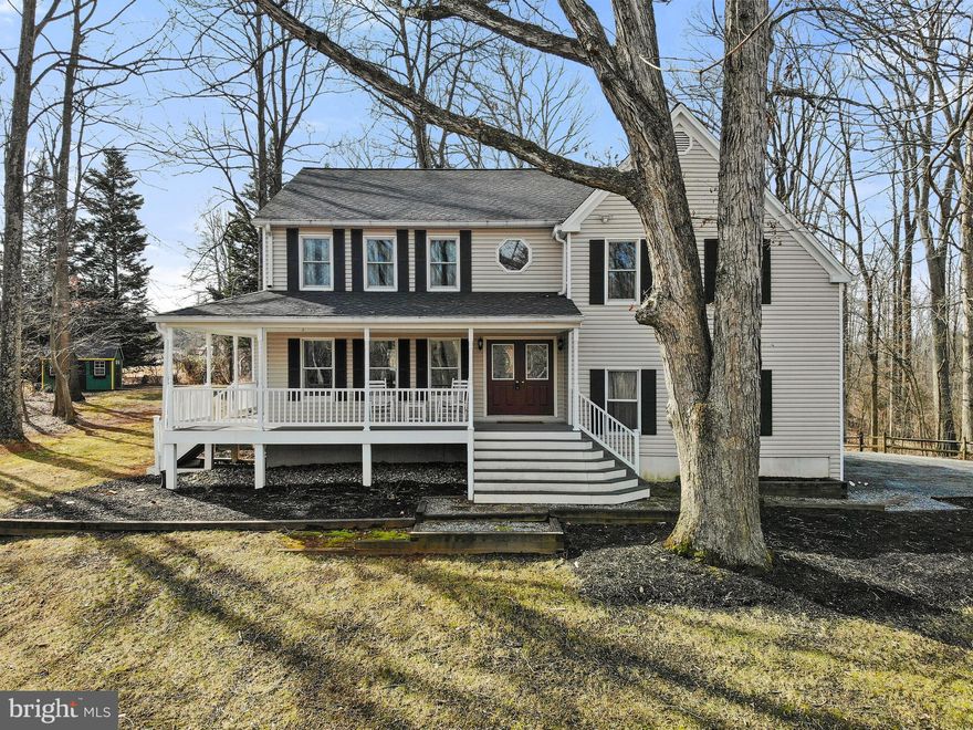 SIMPLY STUNNING, START WITH ME! Set in private location with just three homes on the street. Enjoy time on your large wrap around front porch that overlooks a canopy of trees and nature! This beautifully maintained home is situated on 2 acres which offers that country feel but yet minutes to all the conveniences of town shopping and restaurants! This immaculately presented home includes beautiful hardwood flooring throughout the main level which give this home an open, relaxed feel that is easy to maintain & clean. The kitchen has stainless appliances, granite counters, custom tile back-splash and a large walk in pantry! The kitchen is open to the family room. There is a formal dining room for special occasions and holidays! Work from home, there is cable internet! Upstairs you will find a spacious owners' suite with two walk in closets and nicely appointed master bathroom, with a double vanity, tiled shower and a soaking tub. Not to mention, so many updates! The roof was replaced in February 2020, heat pumped replaced in 2017, the other system replaced in 2014, water heater replaced in 2018, water pressure tank replaced in 2016, water softener installed in 2017, windows replaced in 2018! Carpet replaced in 2016! You will not be disappointed! Welcome Home!