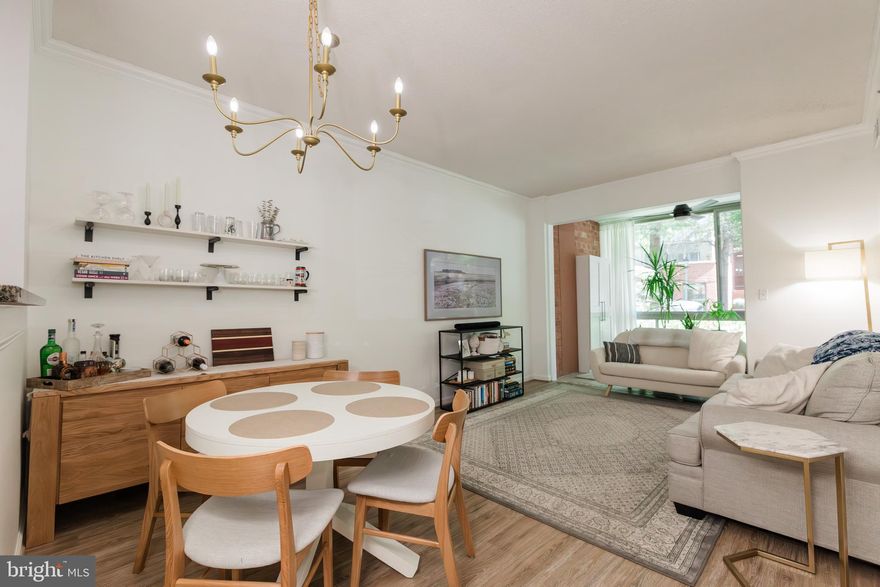 Stunning Ground floor End unit condo! Updated, Fully Remodeled and Ready to Move In! 
This Beautiful Gem features Two Large Bedrooms, Two Updated Bathrooms and Breathtaking Views, facing a Quiet cul-de-sac that is set back from the street by the condo building's front lawn. A Rare Find! Inside, Enjoy 10-foot ceilings throughout, New Plush Carpeting in the Bedrooms, and luxury vinyl plank (LVP) flooring in the living room and dining area!
Enjoy cooking up something good in the Fully Equipped Kitchen with Stainless Steel Appliances and Granite countertops, overlooking the Spacious Living room! Tons of Space and an Open Floor Plan, Great for Entertaining Family and Friends or take the party to the added open Sunroom (which adds an additional 86 Sq. Ft., bringing the total living space to over 1065 sq. ft.)! This Home Has Lots to Offer! Abundant amount of storage with a linen closet, coat closet, and pantry. Both bedrooms are large enough to fit king-sized beds, and the primary bedroom includes a Large walk-in closet with a closet organizer. Updated bathrooms add to the appeal, and an in-unit stacked washer and dryer provide convenience.
This unit comes with one assigned parking spot close to the elevators in the garage. The entire condo building's common spaces were updated in 2021. The building offers fantastic amenities, including a fitness room, community room, business center, concierge service, and a stunning oasis rooftop pool and grill deck. Located within minutes to Ballston Metro (orange and silver line), Ballston Quarters, shops (including Target), restaurants, and more. This condo is perfectly situated for easy access to everything you need. Convenient electric car charging station, additional Storage unit and Car wash facilities/station all included! This Home Truly Has It All!
*****Assumable VA Loan 2.625%***** Call to find out more!