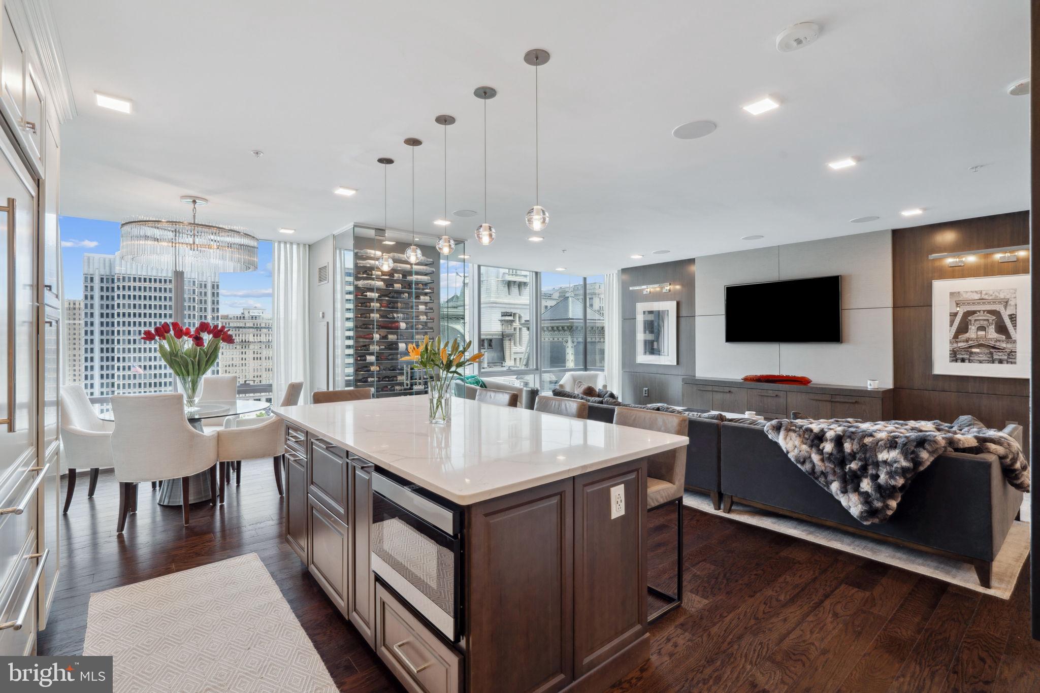 Step into luxury living with this jaw-dropping combo unit 2 bed, 3.5 bath beauty on the 15th floor of the Ritz Carlton Residential. This custom designer unit is a dream come true, boasting 10-foot ceilings, sun-soaked North exposure, and exquisite marble bathrooms. Whip up a storm in the gourmet kitchen equipped with top-notch appliances like Sub Zero refrigerator, Viking gas stove, and Miele dishwasher on sleek marble countertops. The cherry on top? Gleaming wood floors and custom closets and laundry room that will make your heart skip a beat. Every day brings you moments to savor, enhanced by the world-renowned hospitality and celebrated service of Ritz-Carlton. Soaring 48 stories over downtown, you'll experience new perspectives of unparalleled personal service and attention to detail at these 5-star condominiums in Philadelphia. However what truly distinguishes these condominiums is the legendary Ritz-Carlton service and lifestyle of Center City living in Philadelphia. The Residences at The Ritz-Carlton, Philadelphia is our name but our lifestyle is ultra-luxury living in Philadelphia. This units finishes are second to none! - PARKING INCLUDED!!