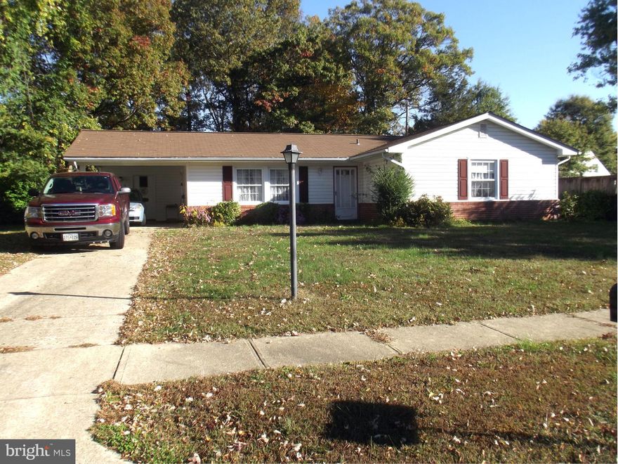 Nice Rambler located in the heart of Waldorf on a quiet court.  Close to shopping & restaurants.  HUGE family room added to the back of the home  22X25 with gas stove for extra heat.  Fenced in back yard.  Sun porch off family room.  Carport.