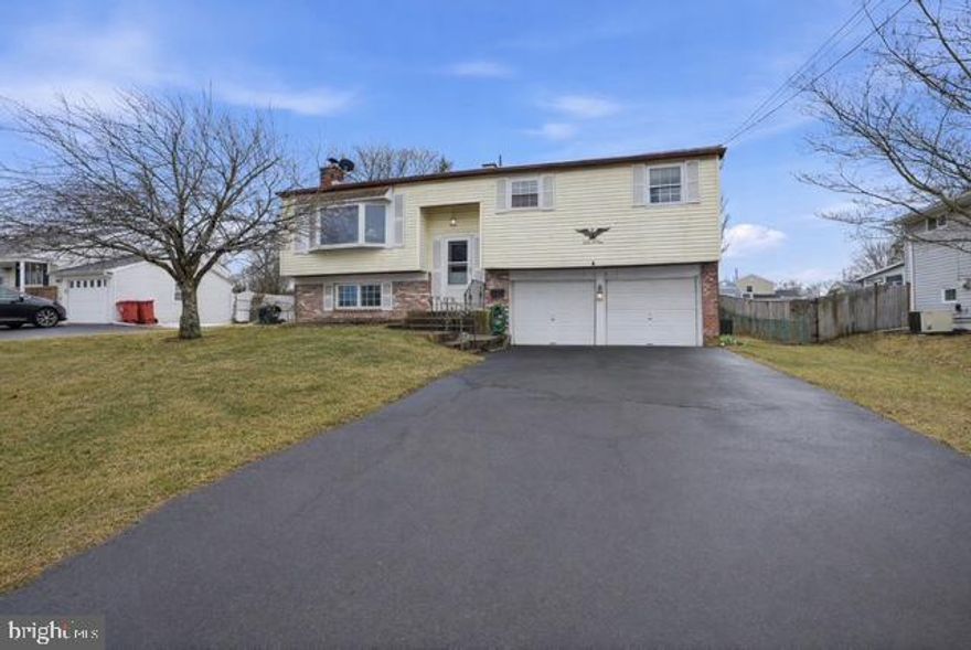 Unlock the potential at 1201 Log College Drive — a solid, well-built bi-level home ready for its next chapter. Set in the established Hartsville Park neighborhood, this property offers the space, layout, and foundation to create something truly special.  The home features three bedrooms, one full bath, living room, dining room and kitchen on the main level. The lower level is anchored by a family room with a bar and wood-burning fireplace, creating architectural interest and a strong foundation for redesign.  There is also a powder room/laundry room for convenience.  Off the family room, a separate flex space expands the home’s versatility. Whether envisioned as a private office, creative studio, fitness room, or additional lounge area, this room enhances the layout and offers direct access to the rear patio and yard — creating a seamless indoor-outdoor connection.  Hardwood floors beneath the carpet present an opportunity for restoration.  The attached two-car garage enhances functionality while adding practical value to the property.  While the property requires updating, it is priced to reflect this opportunity. With strategic improvements, the home’s flexible floor plan, and desirable neighborhood setting offer substantial potential for value creation.  Explore the possibilities and schedule your private tour today.