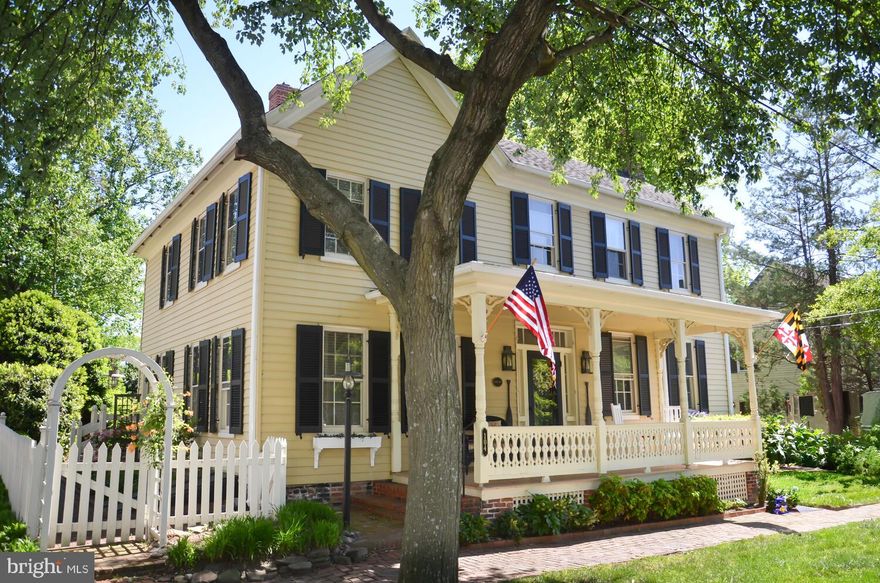 Located in the heart of St. Michaels' Historic District, the "Keithley House," circa 1786, is one of the town's historic treasures. Records indicate the house was renovated and expanded between 1860 and 1870, when Victorian elements were incorporated, including a wonderful front porch. The house was extensively restored and updated in 2008, with care to preserve the 18th and 19th century charm. Most of the heart-pine floors, center hall stairs, sawn balusters, newel post and banister are believed to be original. This is a very charming and livable house. The downstairs  plan includes a comfortable living room w/fireplace; sitting room w/fireplace; dining room; modern kitchen; powder room and laundry area. Upstairs features three bedrooms (one w/fireplace) and two full baths. The house is sited on one of the larger lots and higher elevations in town. Beautifully landscaped, private back yard, with potential to add a swimming pool and/or carriage house (subject to Historic approval). Private driveway/parking area will accommodate 3 cars. Premier location near St. Michaels Harbor, waterfront parks, public boat ramps, a variety of great restaurants, Chesapeake Bay Museum and downtown.