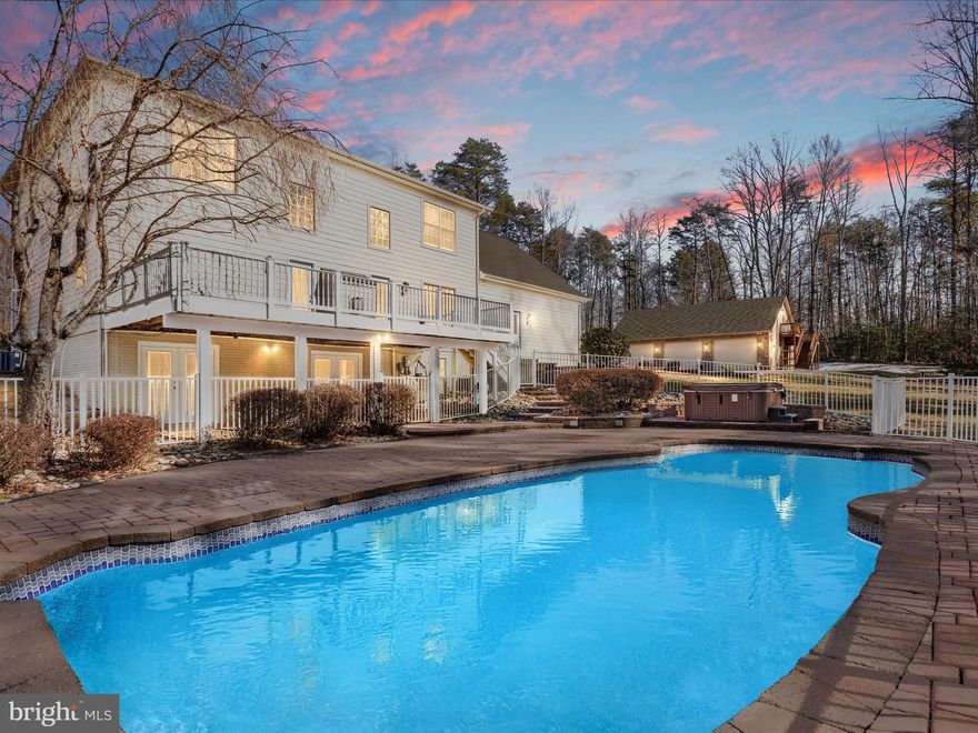 BACK ON MARKET! No fault of owners. Your Private Retreat Awaits—Who Needs a Vacation When This is Home?!

Nestled on over 10 pristine acres, this 4,715 sq. ft. estate is more than a home—it’s a lifestyle. From the moment you arrive, the $100,000 concrete driveway, lined with towering trees and a perfectly manicured lawn, sets the tone for elegance and exclusivity.

Step inside the house and be greeted by a stunning foyer leading to a grand great room featuring a two-level gas fireplace and gleaming hardwood floors. Arched entryways lead you to a cozy sitting area welcoming your guests while the formal dining room, adorned with layered crown molding, sits to the left.

A Home Designed for Comfort & Luxury: 
Upstairs, you'll find four spacious bedrooms and 3.5 baths, including an opulent primary suite with tray ceilings, a large walk-in closet and a spa-like bath. Indulge in the soaking tub, standing shower, and dual vanities—complete with pull-out storage drawers for added convenience. One of the additional upstairs bedrooms features its own private en-suite bathroom, perfect for guests or family members seeking extra privacy.

For added convenience, a large laundry room with built-in cabinets and a spacious quartz countertop makes laundry chores a breeze.

Gourmet Kitchen & Entertainer’s Dream:
On the main level, the chef’s kitchen is designed for culinary excellence, boasting a double wall oven, gas cooktop, center island, and new stainless steel appliances. 

Downstairs, the fully finished basement offers even more living space, featuring a 5th bedroom, full bathroom, lavish custom bar, ice maker, and dishwasher—perfect for hosting guests.

Resort-Style Outdoor Living: 
Step outside to your personal backyard oasis, complete with a composite deck with vinyl rails, a sparkling in-ground pool, and a brand-new hot tub. Whether you're entertaining or unwinding, this space is built for relaxation.

Unmatched Garage & Workshop Space:
Car enthusiasts and hobbyists will love the three-car attached garage PLUS a three-car detached garage, featuring a roughed-in mother-in-law suite—ready for drywall and your final touches. Whether you need extra vehicle or boat storage or a dream workshop, the possibilities are endless.

Exclusive Community Amenities:
Beyond your private retreat, enjoy access to a private lake with a sandy beach and boat slip, tennis courts, and a golf course. Whether you’re spending a peaceful morning by the water, playing a round of golf, or enjoying an active lifestyle, this community offers something for everyone. Close to many wineries including Morais Vineyards.

This estate is the perfect blend of luxury, privacy, and resort-style living—offering everything you need to live, work, and play without ever leaving home. The entire home has been newly painted and all new upgraded carpet. What more could anyone ask for?

Quick access to routes 28, 29 and route 17.

Schedule your private tour today—this one won’t last!