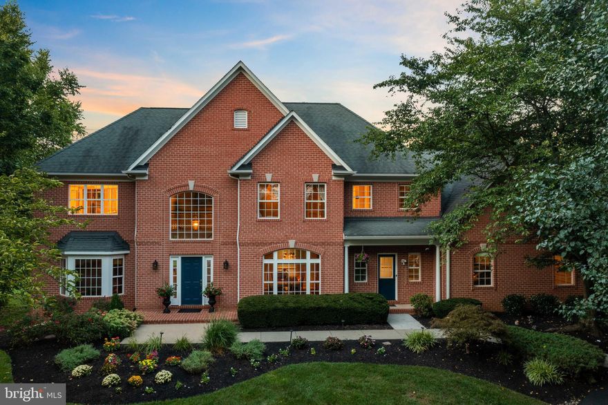 Welcome home to 11617 Quarterfield Drive, located in the sought after Quarterfield Estates neighborhood. Relax your mind each time you drive to your new home, as this beautiful tree-lined neighborhood is surrounded by rolling hill farmlands, yet also gives you the luxury of being close proximity to shopping; Turf Valley Towne Square, Clarksville, Enchanted Forest and  10 minutes from downtown Columbia. This stately 6 bedroom, 4.5 bathroom colonial is the one that you’ve been waiting for. Offering 6,000+ square feet of living space perfectly situated on a flat 1.01 acre lot, it doesn’t get better than this. The front door opens to a two-story entry foyer showcasing a stunning curved staircase and beautiful hardwood floors. The front of the house has your formal living and dining rooms, while the rear of the house has an open concept kitchen, breakfast area and family room.  The gourmet kitchen features an oversized center island, beautiful maple cabinets, granite counters, a double wall oven, gas cooktop and more! Cozy up in the family room with beautiful arched windows and a gas fireplace.  Down the hall you’ll find the butler’s pantry, oversized kitchen pantry, powder room, office, laundry room and an additional second staircase with its own exterior front entrance. If you need space for your cars then you will love the oversized three-car garage! The upper level presents five great sized bedrooms and three bathrooms. The center hall bathroom features a laundry shoot down into the laundry room. The primary bedroom has a gas fireplace and an oversized walk-in closet. The en-suite primary bathroom has a double vanity, jacuzzi tub and a glass shower stall with double shower heads. The lower level is perfect for entertaining as it features a kitchenette with bar seating, a recreation area, games area, 6th bedroom, a full bathroom, a storage area and a walk-out to the side yard. Outside boasts a beautifully manicured flat lot with a private stone patio and a serene pond. An underground electric dog fence conveys, perfect for those with dogs! Schedule your private tour today!