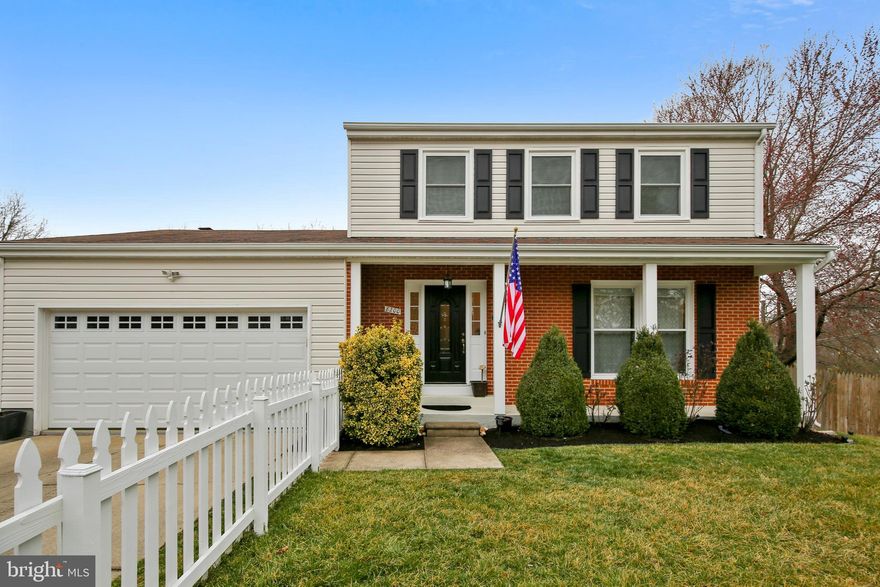 Rare turnkey colonial with 2 car garage in sought after Fort Hunt.  Charming front porch greets you, but the beautiful interior will keep you. Step inside to hardwoods on the main level and crown and chair rail moldings. Delight in the chef's kitchen with stainless appliances, granite counters and warm wood cabinetry.  The open floorplan at the rear is perfect for informal gatherings and day to day living. Formal living and dining rooms provide a respite for adult and formal enertaining, whlie staying within earshot of other activites in the home. Downstairs you will find a (wow!) almost 700 square foot recreation room with tall ceilings and a walkout to the backyard. This space is perfect for watching the game, a childs play area, a home office, exercise space or (yes!) there is room for all of that. A full bathroom and bedroom complete the space and works well for out-of-town guests, inlaws or an aupair.  Upstairs there are three addtional bedrooms and two full bathrooms. The large master bedroom has two closets, an ensuite bathroom with double sinks, and custom tile work. The fully renovated upstairs hall bathroom includes a large vanity with granite counters, bead board trimwork and custom tile. Outside, you will find a beautiful lush fenced yard that is perfect for entertaining. Large deck and patio are ideal gathering spaces for sun-filled days of plays and cool evenings by the firepit.  You can be on the Mt. Vernon bike trail in minutes and enjoy it's 40 miles of trails, scenic water views and historic stops. Only 12 miles to Amazon's new headquarters, 5 miles from Old Town (no stop lights) and Huntington Metro. 11Y bus stop is just a few blocks away. Walk to Stratford Landing Elementary (home of the Advanced Academic Placement Program) and Carl Sandburg Middle School too! Hurry!