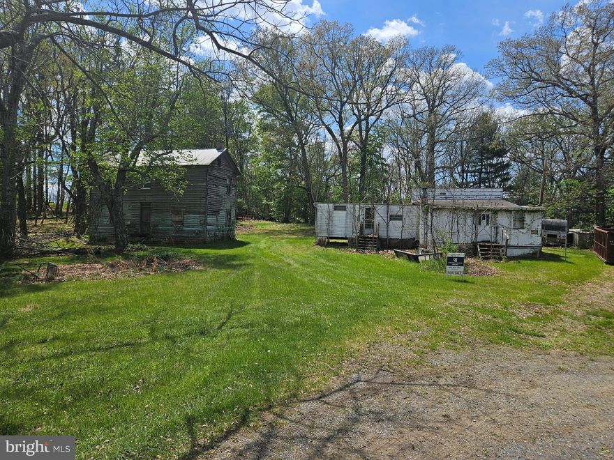 4.2 Acres, Sold As-Is, Flat Usable Lot, Partially Wooded, Well and Septic Exists, Just Outside of Winchester VA, No HOA, Unrestricted. 
Sold As Is With All personal property and buildings on property