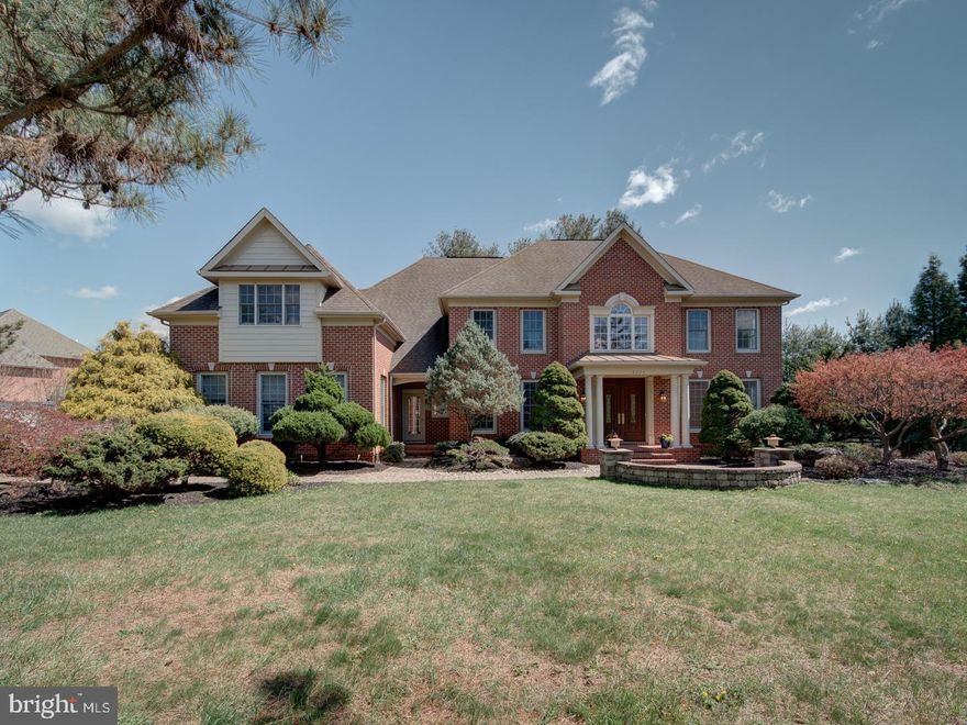 Spectacular, Meticulously Maintained, Move-In Ready Colonial in Prestigious SW Columbia

Welcome to this magnificent all-brick Colonial located on a beautifully landscaped 0.532-acre lot in the highly sought-after Southwest Columbia and within a top-rated school district. This home is a true gem, offering exceptional custom upgrades inside and out.

As you enter the grand 2-story foyer, you're greeted with abundant natural light, luxurious marble floors, and a stunning French Empire crystal chandelier operated by an Aladdin Light Lift. The spacious family room features an ambient gas fireplace framed by custom windows, creating a warm and inviting atmosphere.

The formal dining room is ideal for entertaining, with its tray ceiling and elegant centerpiece chandelier. The gourmet kitchen showcases 42” cherry wood cabinets, granite countertops, a center island with a downdraft gas range, and double wall ovens—a dream space for any home chef. Adjacent to the kitchen, the sun-filled morning room opens to a large deck with stairs leading to the walk-out basement.

Additional conveniences on the main level include a laundry room, mudroom, and a versatile library/home office or 5th bedroom, perfect for working from home.

Upstairs, the dual staircase leads to a spacious landing overlooking the foyer and family room. The luxurious owner’s suite features his-and-hers walk-in closets, a cozy fireplace in the sitting area, tray ceilings, and a large ensuite bath. Two generously sized bedrooms share a Jack & Jill bathroom, while a fourth bedroom enjoys its own private full bath.

The finished walk-out lower level offers ample space for entertaining, complete with built-in sound system, multiple family areas, and a full bathroom. The custom-designed stone walking path and lush landscaping wrap around the home, adding to its charm and elegance.

Other highlights include:

Three-car side-entry garage

Gleaming hardwood floors throughout

Moldings and trim detailing

Spacious, private setting in a premier location

Move right into this elegant, sunlit, and spacious colonial home—truly a rare find!