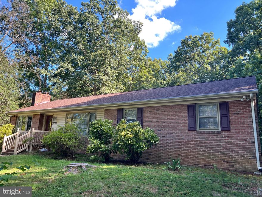 Beautiful and spacious upscale rambler on three private wooded acres with no HOA! Freshly painted throughout and featuring gleaming hardwood floors, this home offers a large country kitchen with all new appliances and a bright breakfast room. The step-down formal dining room, finished walkout basement provides a spacious recreation room with dry bar, family room, and half bath.
This property includes 4 bedrooms, 2.5 baths, a 1-car garage, 2 vehicle carport and a deck overlooking the private wooded lot. Recent upgrades include a new roof, new electric panel box with whole house surge protector, and all new appliances with an oversize refrigerator. The circle gravel driveway provides ample parking, making it ideal for a business owner who needs space to park equipment. Low maintenance yard.
With its unique combination of residential comfort and potential commercial use, this property offers exceptional flexibility. Immediate occupancy available!
No pets allowed, Credit score 680 or higher required. Minimum 2-year lease. Owner will provide Air filets