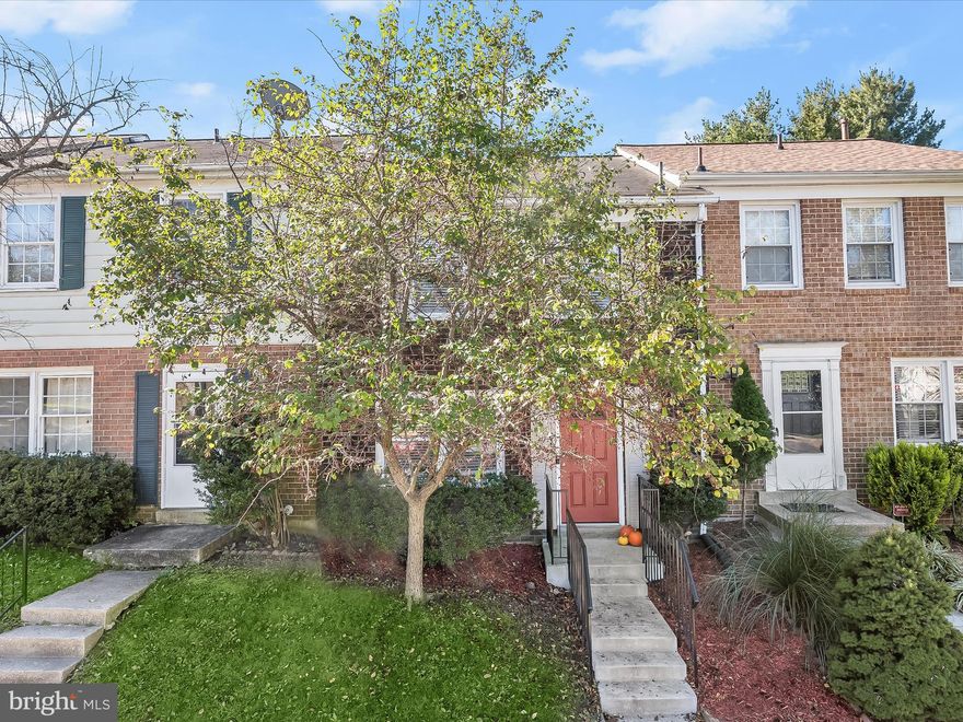 Beautifully updated and nestled on a quiet cul-de-sac in Columbia's sought-after Village of Long Reach, 5757 Yellowrose Court seamlessly combines modern style with everyday comfort. This charming brick townhome showcases gleaming hardwood floors on both the main and upper levels, enhancing its open and inviting layout. The spectacular eat-in kitchen is equipped with sleek stainless steel appliances, decorative backsplash, granite countertops, and ample cabinetry, making it a culinary delight. The open-concept main level is ideal for entertaining, featuring a bright dining room and a spacious living room that flows effortlessly to the private patio and backyard, which backs to peaceful open space. A convenient powder room is also located on the main level. Upstairs, retreat to the serene primary bedroom with an en-suite full bath, while two additional bedrooms with hardwood floors and a shared full bath complete the upper level. The finished lower level offers endless versatility, featuring built-in bookshelves, laundry room, and plenty of storage. Outside, the tranquil stone patio and private backyard, framed by scenic open space, provide the perfect backdrop for outdoor gatherings or quiet relaxation. Conveniently located near Ellicott City, Baltimore, and a host of amenities, you'll have easy access to Columbia Crossing, Wegmans, The Mall in Columbia, and Merriweather Post Pavilion for shopping, dining, and entertainment. Outdoor recreation is also close at hand with nearby Blandair Regional Park and Long Reach Park.