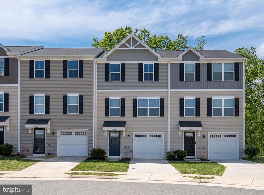 Welcome to 2868 Farzi Cir in the highly sought-after Germanna Heights community! Offering 3 bedrooms and 2.5 bathrooms, this home features a bright, open layout designed for both comfort and functionality.

The heart of the home is the stylish kitchen, complete with stainless steel appliances, a center island, and a cozy dining area that flows seamlessly into the living space. The entire home has been upgraded with durable and modern LVP flooring throughout—no carpet—creating a clean, cohesive feel from top to bottom.

Step right off the kitchen onto your low-maintenance Trex deck—perfect for morning coffee or evening gatherings—with the added bonus of a lower-level patio that can easily be screened in to create your own private outdoor retreat.

Upstairs, you’ll find a spacious primary suite with a walk-in closet and private bath, along with two additional bedrooms, a full hall bath, and a conveniently located laundry area. The  lower level offers flexible space ideal for a home office, gym, playroom, or additional living area.

Enjoy the added convenience of a one-car garage and a walkable location just steps from Starbucks and Walmart, with easy access to dining, parks, golf, and local historic attractions.

This one truly checks all the boxes—schedule your showing today!