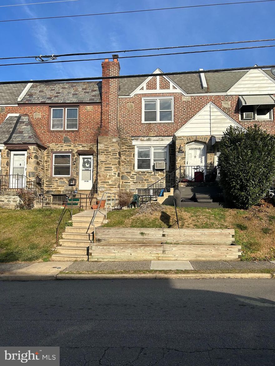 Location! Location!  This large very conveniently located row/townhouse has 3 bedrooms, one full and one half bathroom. Semi-finished basement with a powder room and an attached garage.  Can be a Turn Key Rental or quick flip. Quick closing preferred. The tenant is in the process of moving out. The Property will be delivered vacant.  Steps away from the public transportation ( trolley & bus stop) within walking distance to shopping, restaurants, and recreation. Half a block to school. It is a truly below-market home with all the desired modern amenities and a definite must-see. This house is ready to move in. This house qualifies for a first-time home buyers grant.