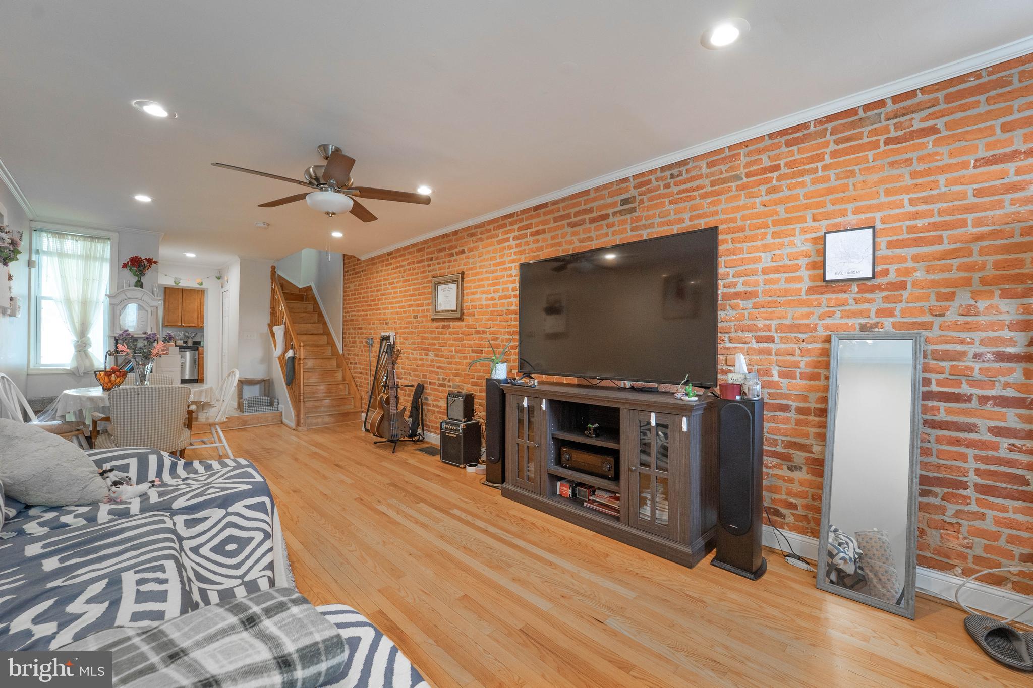 Discover a home that balances everyday comfort with exceptional lifestyle potential. This three-bedroom, three-bath residence in Baltimore’s Canton neighborhood, only 1.5 blocks to the Square, offers generous space, smart design, and a rooftop deck that elevates your living experience. Bright, open rooms and hardwood floors create a welcoming atmosphere, while the modern kitchen is built for a gourmet chef
with ample prep space, stainless steel appliances and smart storage. Just off the kitchen is a private side patio which creates a seamless flow for outdoor entertaining, ideal for hosting summer dinners or evenings with friends. Each bedroom is roomy and private, complemented by three full bathrooms to suit your family’s or guest needs. The standout feature is the private rooftop deck — a huge versatile space where you can unwind, entertain, and take in the unobstructed panoramic views. Imagine evenings watching city lights, or mornings in the sunshine all within the privacy of your own space. Located steps from Canton’s waterfront, shops, and dining, this address connects you to everything you want and need. Whether you like restaurants, shops or enjoy being a weekend warrior, the neighborhood’s energy and convenience are at your doorstep. This is more than just a house — it’s a lifestyle. Schedule your showing today and make it yours before someone else does.