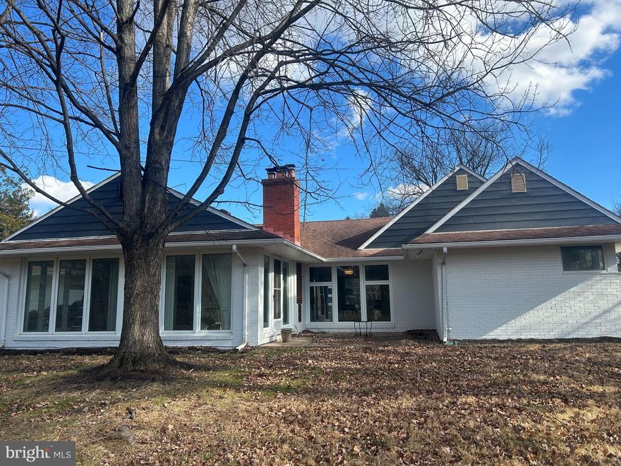 Fantastic Mid Century Rancher in great Pikesville area.  Welcome home to this completely remodeled home offering a perfect blend of vintage features and stylish upgrades throughout. An airy, open layout filled with natural light welcomes you upon entering. Enjoy the thoughtfully designed gourmet kitchen with large island seating and high-end SS appliances. A brick fireplace provides for a cozy living area designed for family gatherings and entertaining.  The built in electric fireplace adds an elegant touch to the dining area. This home offers 2 large master bedrooms with ensuite bathroom. Built in closets provide ample storage in both bedrooms. The room in the back offers multiple usage - additional bedroom- office or additional family room.  From the time you step through the stylish front door, you will experience a cheerful and welcoming vibe. A cozy courtyard patio with built in grill invites for outdoor dining and entertaining.  The large 2 car garage and flat driveway can easily accommodate 6 cars.  Experience all one level living in a beautifully maintained and family friendly neighborhood. Enjoy peace of mind with all new appliances and a brand-new electric heat pump. This home is conveniently located just 7 minutes to the Shops at Quarry Lake – The Fresh Market grocery store, Starbucks, Walgreens and various restaurants. Easy access within 2 minutes to 695. Perfect for "EMPTY NESTERS" or "PROFESSIONAL COUPLE"