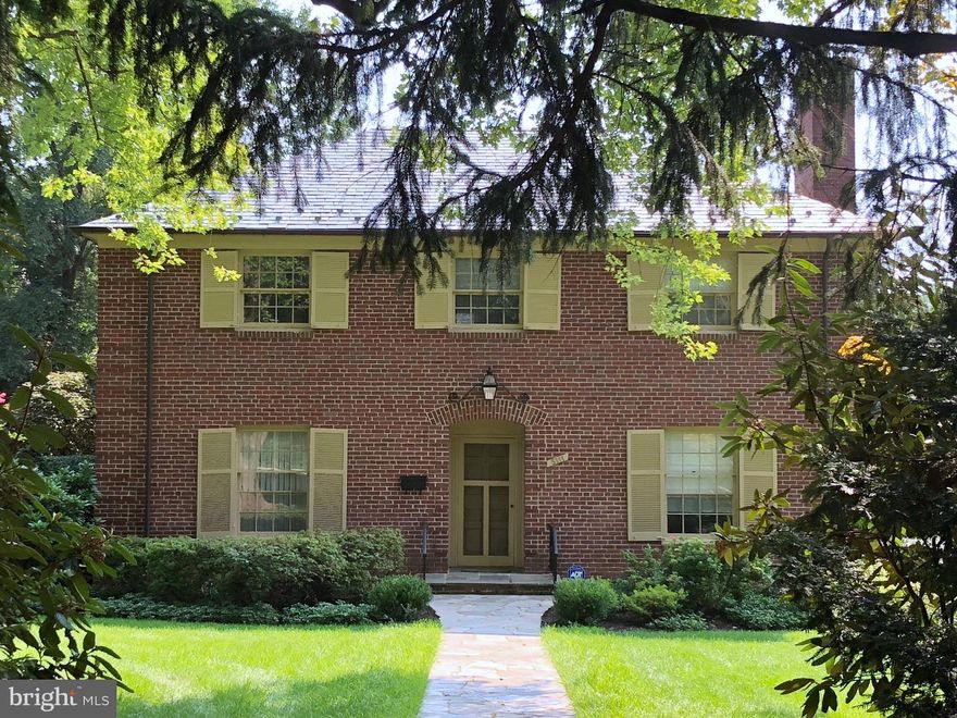 Just across the street from Friends School and Cathedral, this brick Colonial is sited on .4 level acres in Homeland! ALL 3 generous BEDROOMS ARE ON THE SECOND LEVEL! This home boasts a gorgeous living room with French doors to the rear porch and a wood burning fireplace. The separate dining room can comfortably seat 8-10 people perfect for sit down dinners. The huge stone patio off the kitchen is perfect for casual entertaining outdoors. There are gleaming wood floors throughout, a first floor library and a huge lower level recreation room. There s an asphalt driveway plus a two-car detached garage. It s a 10 minute walk to the unique shops, restaurants and the Senator Theater at Belvedere Square.