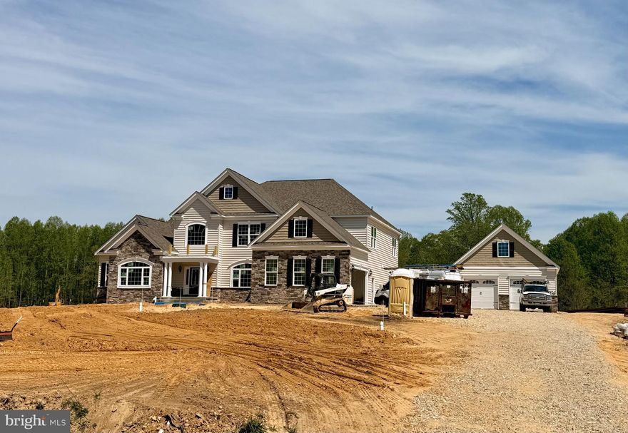 Quality Built Homes "customized" Somerset being built on a gorgeous lot (Open space, approximately an additional 15.488 acres conveys) in Owings, MD!  From the moment you walk in to the foyer, you will love the large plank hardwood flooring, upgraded lighting, primary bedroom on the main level with it's OWN washer and dryer, tray ceiling and on suite bath has separate vanities, soak in tub, and deluxe shower with stunning subway tiles and pebbled flooring. The walk in closet is the size of a bedroom with an Island and custom shelving.  Family Room has a coffered ceiling and gas fireplace for many cozy days/nights, separate dining room with butlers pantry, study, and sunroom that goes out to a beautiful stamped patio.  The kitchen would be any ones dream with a Large Island, stunning granite and lighting, double set of refrigerators/freezers, gas cooktop, built in microwave, farm sink, and double wall ovens. The upper level has a large extra room (above family room) for an extra family room, game room, kids room, endless possibilities. All 3 bedrooms have their own full bathrooms and walk in closets with custom closets plus another laundry room on this level.  The basement has 9' walls, a very large recreation room, media room, bedroom and bathroom and still plenty of storage area and french doors to the areaway leading outback.