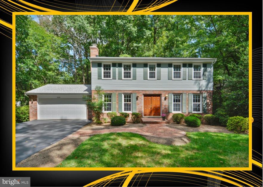 Looking for that big "Dream Kitchen"? This updated, upgraded Home has it and so much MORE!!!  3-Level Colonial w/Fresh Paint, New Carpeting, Gleaming Hardwoods, UPDATED Baths, WALKOUT Basement w/HUGE 5th Bedroom & 3rd FULL Bath, Built-In Bookcases, Craft Room. All NESTLED IN THE WOODS w/ flat grassy front yard play area, numerous other updates & upgrades throughout!   OAKTON HIGH SCHOOL Pyramid!!!