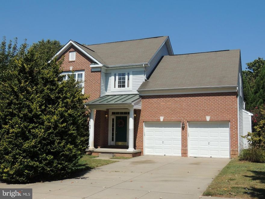 Beautiful colonial in Monmouth Meadows * 4 BRs,3   BAs,3 levels of living w/ 2 car garage * New carpet & fresh paint in BRs & finished Lower Level includes Rec Room, full BA & poss. 5th BR/Den to be finished & Lots of Storage * Large Rear Deck overlooking secluded Premium lot * Home security system * New sump pump, hot water heater, outside a/c unit & offering Home Warranty * Motivated Seller!