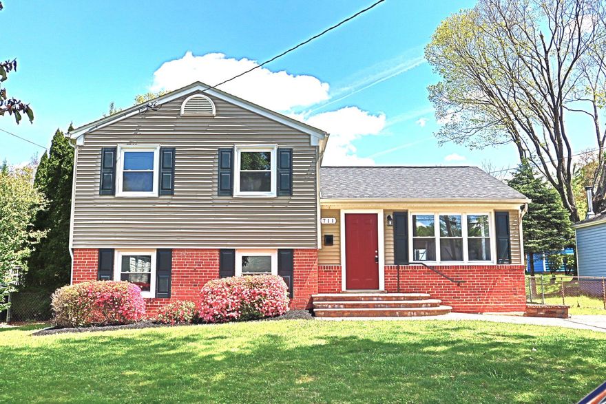 Super Cute Home Alert! Looking for adorable? Looking for the prettiest home in town? Well, you've found it here at 711 Woodburn Road, this Dream Home checks all the boxes and has everything you want and need!  Main level features a large sun soaked living room, spacious dining room, and gourmet kitchen w upgraded cabinetry, calacatta quartz, carrera splash and beautiful Whirlpool stainless appliances. Great circular flow inside and out for easy entertaining. Upstairs you'll find 3 large bedrooms and a beautifully renovated bath. Large rear primary features closet space galore and private access to the bath. The luxurious bath features porcelain tile floors and surround, a furniture quality vanity and carrera marble. Stunning hardwoods on the main and upper level. Plenty of closet space, tons of natural light. The versatile lower level features a large family room or legal 4th bedroom, a renovated bathroom boasting custom tile, upgraded vanity and XL tub, and a large laundry/utility room. The oversized utility room boasts plenty of usable space for a home gym or office. The lower level would make a great separate living space in a roommate or extended guest scenario and has its own rear entrance. The fully fenced rear yard is the perfect rectangular shape and size, private and serene with beautiful mature landscaping, large deck and XL storage shed. Off street parking for 2 cars and great curb appeal. Artistic blend of original vintage details and today's modern necessities. Beautiful moldings, millwork, materials and finishes. Virtually all is new/newer. Great location so close to Metro, 355/28/270/ICC, shopping, casual and gourmet dining, solid schools, parks, tot lots, trails and all Rockville has to offer. Minutes to Bethesda, DC and points south. Come visit the very walkable neighborhood, wander around, people watch, you'll love the vibe!  Very desirable area with warm welcoming neighbors and a true sense of community. Truly a great home in a great place to call home, come live your dream of homeownership here at 711 Woodburn Road, your ultimate urban oasis!