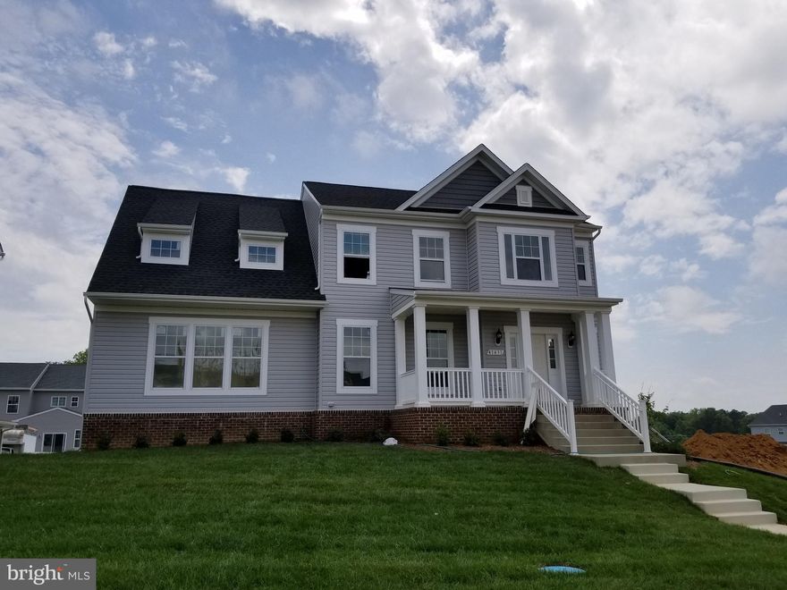PROJECTED MAY 2019 DELIVERY: Three Levels Finished. Hardwood at DR,Kitch&Foyer, SS Appliances w/Double Ovens & 30" Elect. Cooktop, Upgraded Cabinets throughout, Gas Fireplace, Front Porch, 3.5 Baths, 4 BR, Ceramic Tile at Owner's Bath Floor & Upgraded Tile at Owner's Shower Walls & Tub Surround, Finished Rec Room & Full Bath, Community Pool, Clubhouse, Tennis & Basketball Courts, Walking Trails.