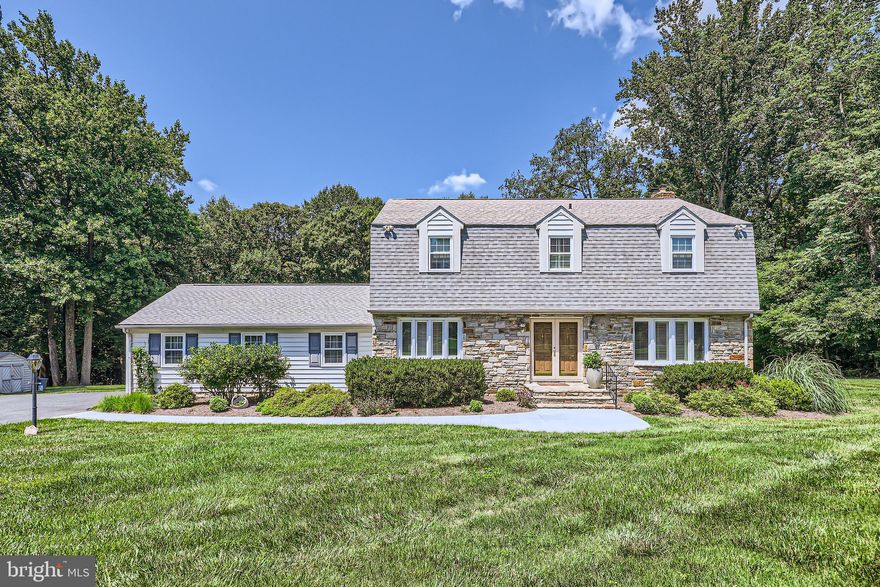 Absolutely stunning Dutch Colonial w/3200+ square feet of living space.  This property located in Baldwin in the subdivision of Long Green Manor is situated on a picturesque 4.55 acre lot located in a private, quiet cul de sac in northern Baltimore County.  This home has been updated and enhanced through the years and has been meticulously maintained and it shows. This well built 4 bedrooms, 2.5 bath home has an oversized 2 car garage, the interior has hardwood & tile floors throughout the entire home, including a stone wood burning fireplace and custom made oak cabinets in the family room.  All bedrooms have large spacious closets. The kitchen boasts granite countertops, stainless steel appliances, including gas stove, and it's a perfect place for overlooking a beautifully landscaped backyard, or choose to have your coffee outside on the bluestone patio. During the winters  enjoy the wood burning fireplace from the family room while catching up on your reading.  The dining room and living room both have plenty of natural light hiding behind plantation shutters. The lower level Rec Room and separate office are completely finished with multiple phone jacks and cable outlets.  Separate utility room featuring wine storage and more.  Both fiber optics and cable in house.  Blue ribbon schools and shopping are minutes away, all conveniently located to I-83 & 695.    Email or Call John to request showing —-SHOWING BY APPOINTMENT ONLY!