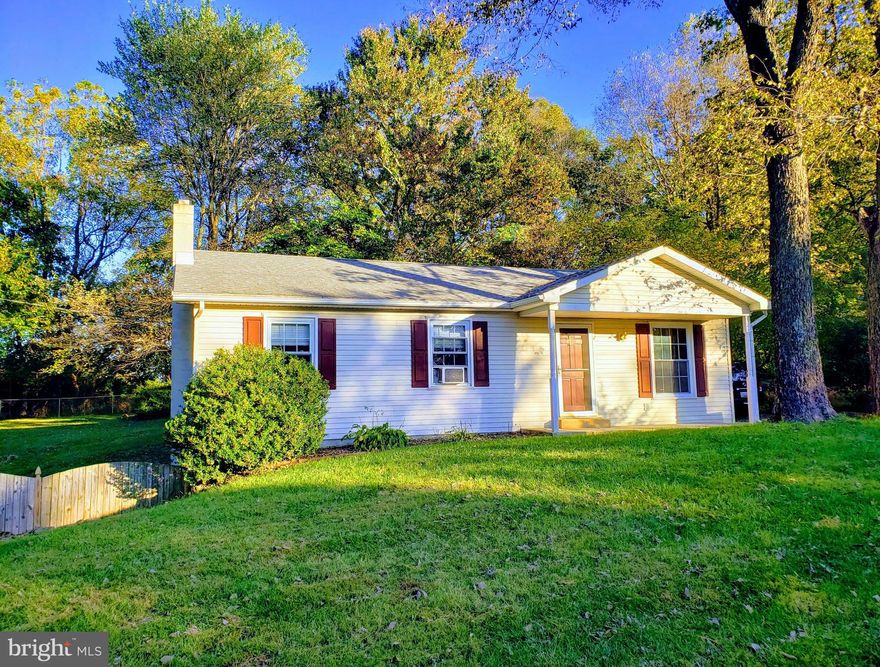 4 bedroom rancher with full finished walk-out basement in an established community in Shepherdstown.  Great ranch home, new roof in 2016, and freshly painted.  New carpet and professionally cleaned.  This is MOVE IN READY!  Hardwood thru main floor.  Finished walkout basement on partially fenced 1/2 acre lot.  Home is fenced in rear and backs to trees.  Enclosed screen porch off of kitchen extends living space.  Master suite with bathroom.  Full bath in basement.