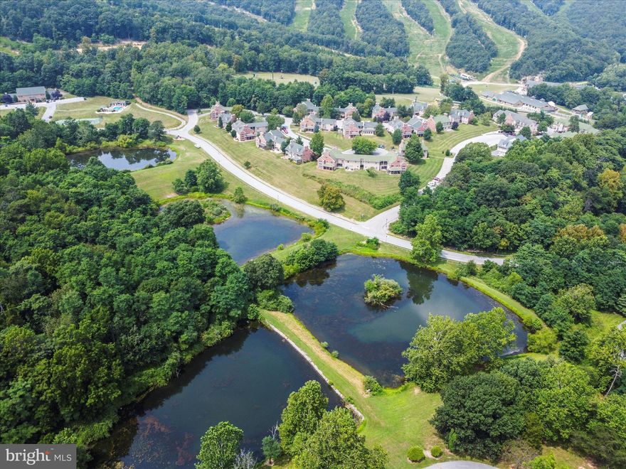 NEAR, FAR, & All-In-Between-!! WHY Buy a Property, When you can Purchase an EXPERIENCE??!?! Marketed Incorrectly on Purpose (to HIDE the GEM of a Secret from the World), Whitetail Resort Community is Unlike Anything Else-!! Nestled in the Valley, Tucked into Nature, and Embodying ALL things Beautiful - this is NOT a Property, it is an Experience!! No Matter the Time of Year, you are Greeted with Flourishing Elements of Nature, yet have Convenience at your Fingertips...thats Right, Its ALL Here! Memories, Events, Income, & MORE; Live in Wonderland YEAR-Round -or- Rent it for Additional Income at ANY time of the Year! Mercersburg is Boastful of Charming & Chipper Festivals, Friendly Shop Owners, and Endless Outdoor Adventures! This is a "DOUBLE HALLMARK" Situation; Mercersburg will have you Warm at Heart, then Stroll on Home to your Whitetail Community and Enjoy a Whole NEW Feeling of "Cozy Home." It is IMPOSSIBLE to get "Bored" unless you mean Snowboarding! This Community is Inclusive of Top-Rated Ski Slopes, a Community Swimming Pool, Ponds, Tennis Courts, Walking Trails, Golf Course, Hiking, and just Endless Natural Beauty! ((INSIDE, You Ask??)) This Mountainside Retreat is a MASSIVE (4) Bedroom, (3) FULL Bath, w/ a 14x9 LOFT -Overlooking the Family Room Below- (3)-Story CORNER Unit! EVERY Level Features a FULL Bath & BEDROOM for the Most Diverse Use of the Layout! Want a "Home for the Holidays?" - With Balconies, Vaulted Ceilings, and Floor TO Ceiling Windows; This could be your Next Magazine Feature Home for EVERYONE to Love (Picture the 15FT+ Tree!)!! Like to SAVE MONEY?? (Who Doesn't??) - Let's Talk Maintenance & Welfare; Geothermal HVAC System is Inexpensive to Operate, ALL Systems have been Serviced 2x Per Year, NEW Appliances, Water Routinely Tested, NEW Water Heater 10/2024, NEW Roof 12/2018.  Community WILL Allow Modifications (I.E.  Additional Patio, Screen Porch, Etc. - Approval Required). Own a Piece of One of the Most Loved Locations Around-!! If you are a Business-Minded Soul; THIS Property WILL Bring a Whole NEW Quality of Life! The BEST thing to hear from your Neighbors is how Much they LOVE Living there and how it was an Amazing Investment for their Family, Life, & Future! Allow this Retreat to Speak to YOU - We Welcome YOU Home! (Home CAN Come FULLY Furnished)