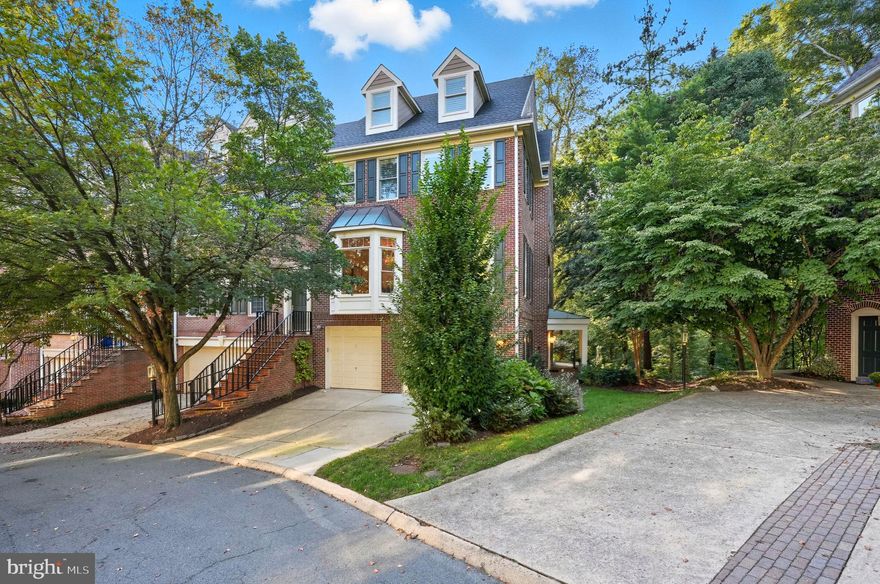 WELCOME TO HILLCREST  2124 21st Rd. N. is set within Hillcrest, a private community of 33 townhomes on seven landscaped acres in North Arlington. Positioned above Spout Run Parkway and the Potomac River and bordered by National Park Service land, the setting offers a sense of separation while remaining close to DC and the surrounding neighborhoods.   AN END UNIT WITH A STANDOUT POSITION This four-level end-unit townhome sits on one of the more open lots in the community, with added privacy and natural light from windows on three sides. The elevation and orientation give the home a quieter feel than many comparable townhomes. WELL MAINTAINED WITH MEANINGFUL UPDATES  Since its last sale, the home has been refreshed with new hardwood flooring in the bedrooms and a full interior repaint. Systems have been thoughtfully updated, including a new gas furnace and air conditioning for the first and second levels, a separate heat pump for the upper floors, a whole-house surge protector, updated fireplaces, a new skylight, and a modern washer and dryer. Ongoing care has included annual termite inspections and quarterly pest control. A PRACTICAL FOUR-LEVEL LAYOUT  Approximately 3,800 square feet are spread across four levels with four bedrooms, three full baths, and two half baths. The main level offers formal living and dining spaces alongside an oversized kitchen that opens to the family room and deck, making it easy to host or simply live day to day. The lower level includes a family room with a gas fireplace and wet bar, a powder room, and access to the two-car garage and rear patio.  FLEXIBLE UPPER LEVELS & ELEVATOR ACCESS  The third level includes the primary suite and additional bedrooms, while the top level provides a private bedroom suite with vaulted ceilings and an en-suite bath — well suited for guests, multigenerational living, or a dedicated office. A private elevator connects all four levels and adds ease to daily living. EXTERIOR IMPROVEMENTS THAT MATTER Exterior updates include a new roof, fresh exterior paint, landscaping improvements, oversized gutters with leaf guards, a deck finished with low-maintenance Azek materials, Pella Proline aluminum-clad wood windows, and a sliding kitchen patio door with a lifetime seal warranty. A SOLID, MOVE-IN-READY OPTION IN NORTH ARLINGTON With its end-unit location, private elevator, recent system updates, and clear record of maintenance, 2124 21st Rd. N. offers a comfortable and well-cared-for home in one of North Arlington’s established townhome communities.