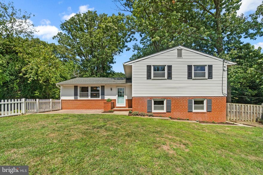 Welcome to your dream home! This beautiful 4-bedroom residence features a gorgeous white kitchen, complete with stainless steel appliances, including a French door refrigerator and gas stove. The heart of the kitchen is its large center island, complemented by quartz countertops. Enjoy easy access to your back porch and backyard, perfect for outdoor entertaining.


The adjacent dining area flows seamlessly from the kitchen, all set on gleaming hardwood floors that extend throughout the main and upper levels. Upstairs, you'll find three generously sized bedrooms, including a spacious owner's suite with a large closet and a private ensuite bathroom.


The finished lower level offers endless possibilities, with an additional room that can serve as an office or bedroom, built-in bookshelves, a large family room, and a full second kitchen. This level also includes a full bath and a separate entrance, making it ideal for an in-law suite or guest accommodations. Additionally, there's an unfinished area providing about 700 sq. ft. of extra storage space.


Outside, you'll love the large deck, detached 1-car garage, and the fenced rear yard, all set on a private lot with stunning views. This home is a rare find and ready to welcome you!