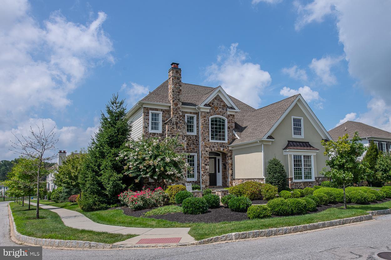 This absolutely stunning 4 Bedroom,4.1 Bath, 6,177 sq. ft. luxury estate home, is perfectly situated across from the Pavilion Park, in the wonderful Liseter community. The open floor plan of this custom Magnolia Heritage model features a two-story Entry Foyer & Living Room, beautiful tile & hardwood flooring, sunlit rooms, and is filled with upgrades, extras and decorator touches. The Family Room is striking with a dramatic 20 ft. coffered ceiling, an expanded two-story bow window wall bathing the room in an abundance of natural light and is perfect for entertaining family & friends. The adjacent spacious Breakfast Area provides convenient access to the rear Deck and Patios. Enjoy preparing meals in the light & bright Gourmet Kitchen with upgraded white cabinetry, Zodiaq Corian® quartz countertops, ceramic & glass dimensional tile backsplash, top-of-the-line, stainless steel appliances, and an oversized 8 ft. Center Island with seating for four. Impress guests in the exquisite Formal Dining Room with dual wine coolers, custom cabinetry and a quartz serving area. The luxurious 1st floor Master Bedroom Suite is an oasis, with 10 ft. tray ceiling, spa style en-suite Master Bathroom with oversized double marble shower with seamless glass doors, Roman tub, and a spacious walk-in closet. A 1st floor Study, Powder Room, expanded Mudroom/Laundry Room complete the first floor living area. The second floor features 9 ft. ceilings, a Princess Second Bedroom with en-suite Bathroom, a large Loft/Play Area and the Third & Fourth Bedrooms that share a Jack-n-Jill Hall Bathroom. The Finished Basement is AMAZING and offers a spectacular Great Room complete with Custom Wet Bar with seating for six, comfortable Sitting Area, Dining Area, glass enclosed, temperature controlled, Wine Cellar, and two Game Areas. There is also a Media Area, Exercise Area, another Game space and a Full Bathroom. Plus there is a separate enormous un-finished storage/utility area. Double French doors open to a walk-up pathway to the rear multi-tiered Deck and Paver Patio Areas, featuring a stone fireplace, with sitting area & pergola, dining area, and a granite & stone island with built-in barbeque, perfect for outdoor gatherings. This exquisite home truly HAS IT ALL! And all if this could be YOURS! Start enjoying the Liseter lifestyle that offers a Clubhouse with Full Gym, Infinity Pool overlooking open space, the Carriage Barn for gatherings and events, Walking Trails, Tennis Courts and a quaint Post Office. Why wait for new construction when you can move right in to this wonderful, better than new, home with an unbeatable location. Minutes from the Paoli train to Philly, downtown Wayne, shopping, restaurants, and the new Newtown Square Town Center, it offers an EZ commute to center city Philadelphia and the Philadelphia International airport.