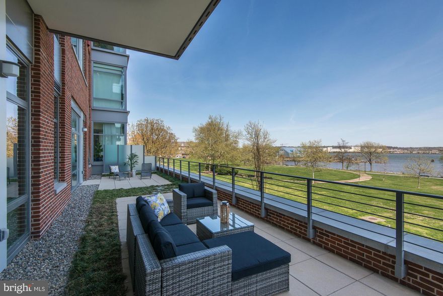 Spectacular condo living in a 3 bed/2.5 bath-all on 1 level home.River views from every room, soaring high ceilings.Tranquil setting near parks, bike trail, waterfront +near shops & restaurants- urban lifestyle.Pool, gym w/ yoga classes, game room, kids playroom, pet washing station,garage, 24 hr. concierge, hospitality committee arranges social events, book club. "Must See Inside!"