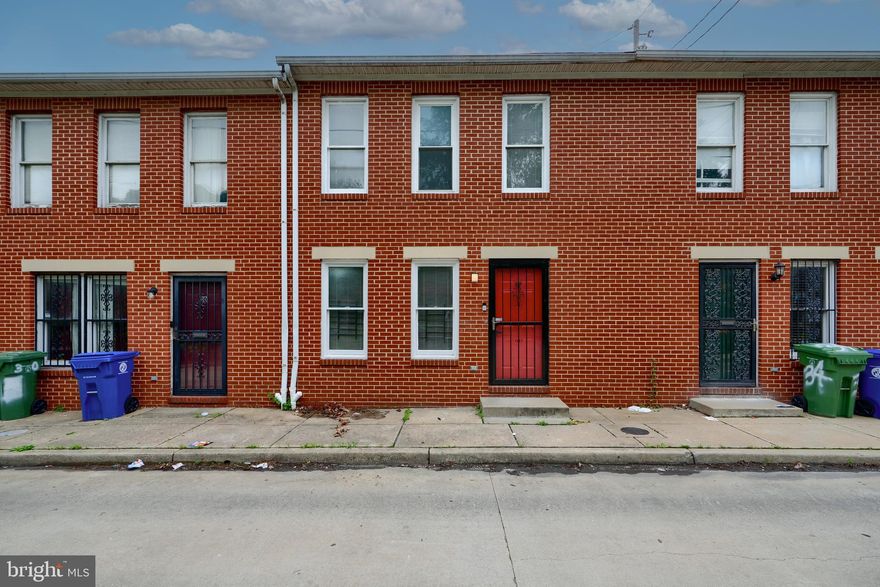 Nestled on a private street minutes from Johns Hopkins; awaits this fully remolded 3 bedroom brick townhome. Once inside you are greeted with freshly painted walls and new flooring. The kitchen boasts marble countertops, new stainless steel appliances, and beautiful white cabinets. There's ample living space between the separate living room and dining room. Not to mention a fully finished basement with a bar; perfect for entertaining. On the top floor you'll find 3 generous sized bedrooms and a completely remolded primary bathroom. No need to worry about parking...You are assigned 2 parking spaces right in front of your new home! Don't wait...schedule your showing today!