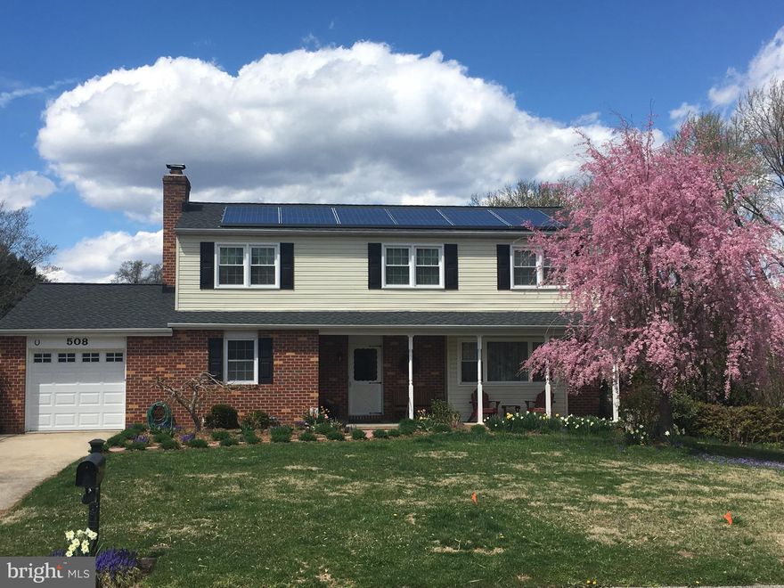 Recently updated beautiful home conveniently located on quiet street in small, desirable community. Hardwood floors throughout, updated kitchen with granite, stainless steel appliances, bar and white cabinets. Spa-like baths create that Zen-like feel, especially with the radiant heated floors in both full baths. Family room features built-in workspaces with granite tops and gorgeous stacked stone fireplace with floating custom bamboo mantle and slate hearth perfect for chilly nights.  Spacious bedrooms; master bedroom features walk-in closet and bath. Many fixtures Restoration Hardware.  Large, beautifully landscaped level yard with spacious covered patio is perfect for entertaining or relaxing. The finished Owens Corning basement keeps lower level cozy and quiet. Come see your new home!