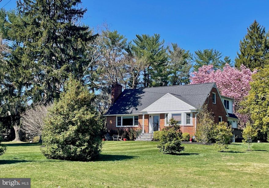 OFFERS TO BE PRESENTED ON TUESDAY, APRIL 2 AT 7:00PM. Deceivingly large expanded cape cod  with rear and second level additions! Beautifully maintained and updated by the current owners who have truly enjoyed being the stewards of this warm and welcoming home. Inviting front walkway and patio lead to a covered front entry.  Foyer with coat closet and powder room is flanked by the living room on the left and a main level bedroom on the right.  Living room and dining rooms have hardwood flooring, crown moldings and oversized windows and both enjoy  warmth from a gas insert fireplace. The main level bedroom has hardwood flooring under the carpeting, and a bay window overlooking the front yard. The current owners added a gorgeous family room off the back with french doors to the private rear patio.  The kitchen has been updated with stainless steel appliances including double ovens, 5 burner propane cooktop and fridge with a freezer drawer, granite counters with a breakfast bar, gorgeous and ample cabinetry. A spacious informal dining area is open to the kitchen and family room. The laundry is just off the dining area, with more pantry storage and a wash tub.  The upper level was expanded to enlarge the owners suite - it now has a cathedral ceiling, walk-in closet and a luxurious bath with dual-sink vanity, skylight, jetted soaking tub and separate glass-enclosed shower. There are two other expansive bedrooms with plenty of closet space and hardwood flooring under the carpeting. The full bathroom in the hallway was also renovated with ceramic tile flooring, a ceramic tile surround tub/shower and a Silestone counter vanity.  A cozy recreation room with a brick surround gas insert fireplace and knotty pine paneling in the lower level, as well as a second recreation room with an awesome granite topped bar and recessed lighting. The bar area has an exit to the side yard. An office/exercise room is off the bar area and also has knotty pine paneling. A third full renovated bathroom features ceramic tile flooring and a ceramic tiled shower.  Huge storage/utility room with a cedar closet, and another storage room. The lot has been professionally landscaped and maintained. Beautiful private patios on the front and rear of the home, and spacious level front, side and back yards. The front walkway and patio were completely redone in 2020 - great place for coffee in the morning. The rear patio was done in 2002 and makes a tranquil and private setting for dinner al fresco or entertaining. The garage is detached and will fit two small cars, or make a great workshop or studio. Electric car charger at the end of the driveway! Public water and sewer, electric heavy up in 2001, Oil burner 2011, Anderson insulated windows throughout, roof replaced in 2022, new carpeting installed March 2024.  Seller may need a rent back until the end of June.