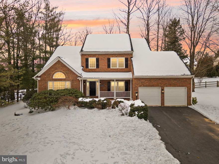 Beautiful single-family home offering over 3,200 finished sq ft on the main level plus an additional 1,358 sq ft in the finished lower level. A dramatic two-story foyer and soaring ceilings welcome you, with hardwood floors throughout the main living areas. The main level includes an open den/ office, formal dining room, and a two-story great room centered on a floor-to-ceiling stone gas fireplace.

The spacious, open kitchen features a large center island and an attached breakfast room, with direct access to an expansive deck that goes across the entire back of the home and includes a pergola overlooking a large backyard—ample space for sports or a future pool. A rare main-level primary suite offers a walk-in closets and a luxurious bath with a separate soaking tub and glass-enclosed shower with dual shower heads.

Upstairs, open hallways lead to three guest bedrooms: two share a full bath while the third boasts a private ensuite and walk-in closet. The extensively finished lower level is ideal for entertaining, with a generous recreation/family area, fully appointed wet bar, game room, and exercise space.

The home is just minutes to Reston Town Center, the Reston Metro, Route 7 and Tysons!