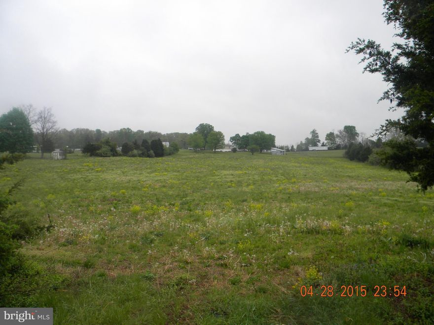 Nice flat lot with over 5 acres. Located just off of Rt. 55 West in Strasburg. New survey has been completed and lot has been approved for a 3 bedroom alternative septic system. Storage shed on property. This is the perfect lot outside of town limits but only minutes to all downtown shopping, interstate access and schools. Ready for your dream home!