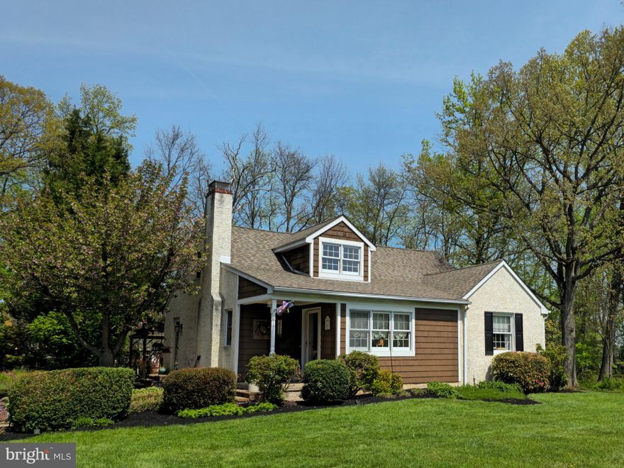 Charming Cape-style home in highly sought-after Skippack Township, this beautifully maintained 4-bedroom, 3-bath residence offers move-in condition and easy access to Skippack Village shopping and dining. The floorplan features a first-floor master suite with a private bath, two additional bedrooms upstairs and a versatile fourth bedroom, while updates throughout — including a newer, updated kitchen and new carpeting — provide modern comfort without losing classic charm. A cozy fireplace anchors the living area and the walk-out rear leads to a private backyard with a hot tub and storage shed, perfect for relaxing or entertaining. Set on over an acre of level, wood-lined land, the property delivers both privacy and outdoor possibilities. This home is ready to enjoy now and offers room for future personalization—schedule a showing today.