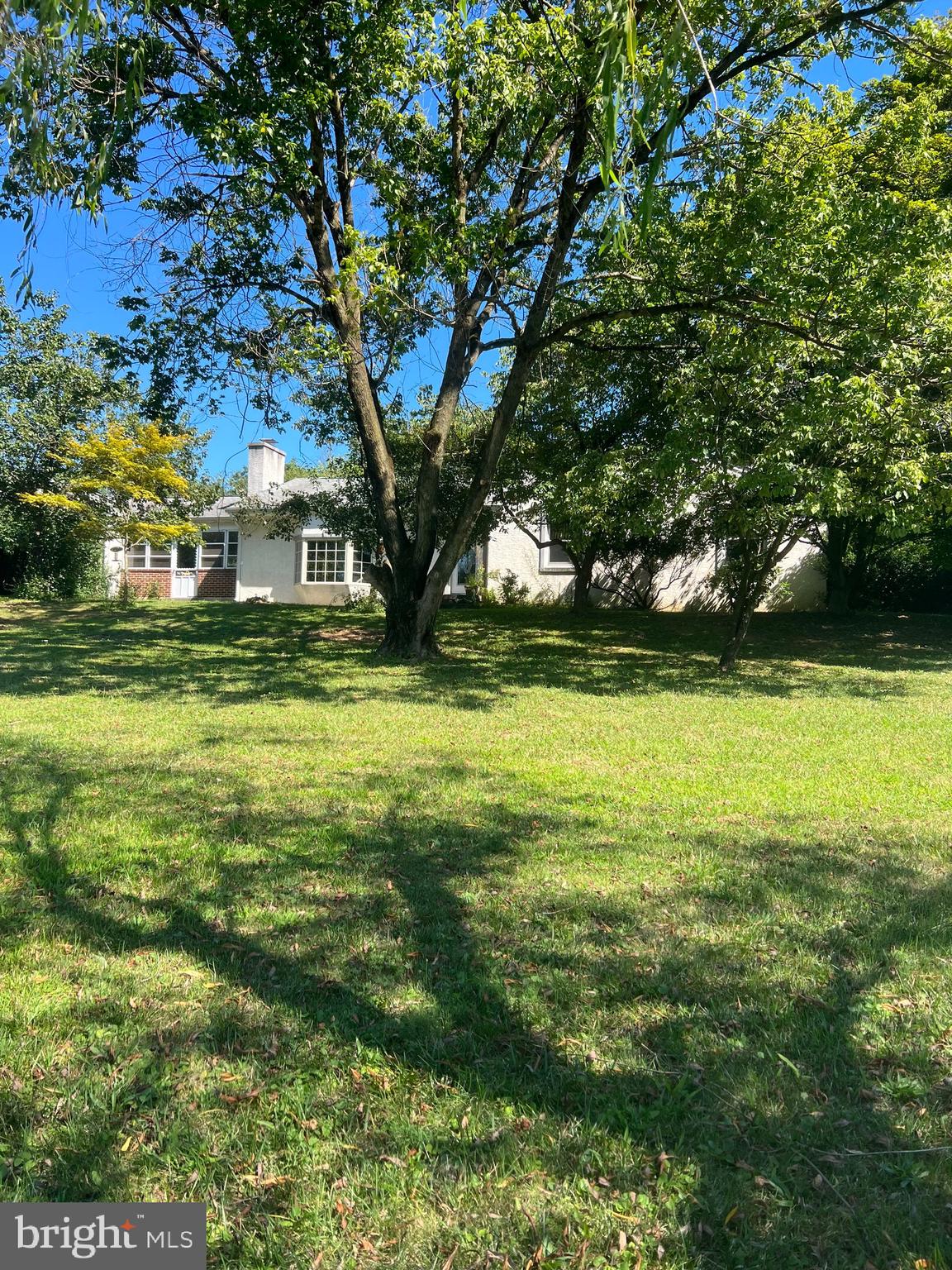 This unique five-bedroom, three-bathroom ranch-style home rests on 1.74 Acres in Lower Gwynedd, Township. Lot dimensions are 214 feet in width and 354 feet in depth. The exterior is entirely clad in stucco and complimented by a sunny Bay window. Inside, you’ll find a cozy fireplace and Hardwood flooring traverses the hallway and all of the bedrooms. Upgrades include newer windows, central air conditioning, an updated heating system, and 200 amp electrical service. While the interior is in need of updating the home remains fully operational so you can easily live there while working on it. The location is close to a long list of restaurants and shopping and as an extra bonus you are in the Award Winning Wissahickon School District. Don't miss the excellent opportunity to gain some some sweat equity and make this house your home!