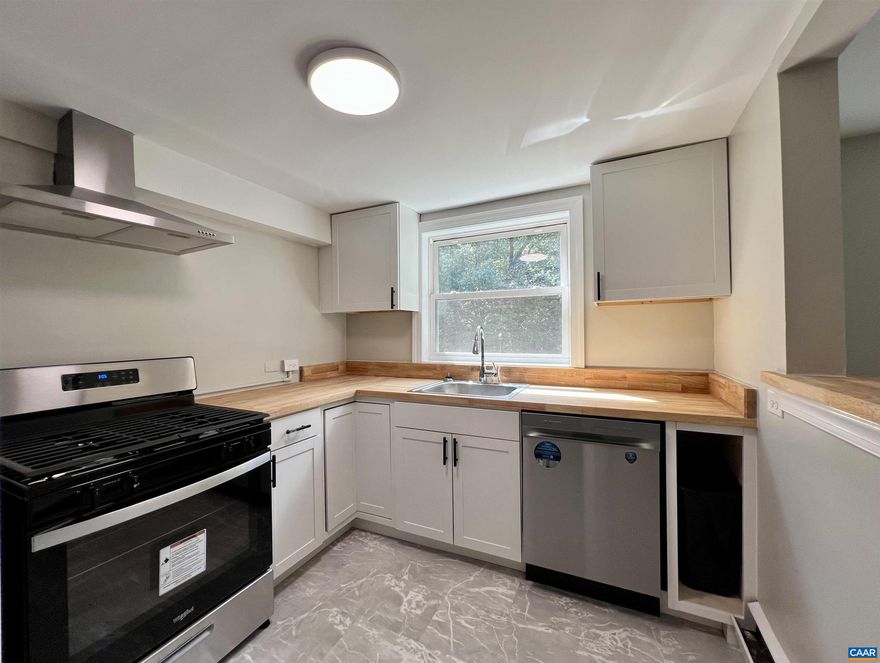 Available as early as October 1st! Prime location less than a mile from Durty Nellys, these units are entirely renovated, brand new kitchens, floors, paint, fixtures, and customizable mini-split AC for each room. There is off-street parking behind the house for 5-6 cars with ease.   Included in Unit "B": 2 Bedrooms, 1 bathroom, including in-unit laundry and a light filled living room that includes a newly added open concept with the kitchen. Live with privacy on the top floor of the house!  Security deposit is equal to one month's rent, pets are considered with owner approval.   Tenants are responsible for all utilities. 12 month lease terms. Smoking inside the property is not allowed, pets are allowed with owner approval on a case by case basis. Unit "A" is also for lease! Listing agent has an ownership interest in this property.  Listing agent has an ownership interest in this property and is a licensed real estate agent in Virginia.