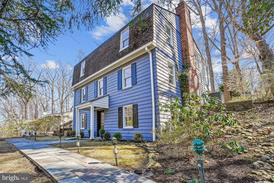 Major Price Improvement!!! Welcome to your dream home in the picturesque Rollingwood neighborhood of Chevy Chase! This stunning 4-bedroom, 3-bath residence offers a perfect blend of classic charm and modern amenities.
Nestled in a serene setting with mature trees and a scenic pond view right across the street, this home provides a tranquil escape. Enjoy the convenience of being steps away from Meadowbrook and Rock Creek Park, perfect for outdoor enthusiasts. The home features a private driveway that provides convenient rear access directly to the main level.
 
Step inside to find beautiful hardwood floors throughout. The living room boasts a refurbished wood-burning fireplace, creating a cozy ambiance. The family room addition provides extra space for gatherings. Both rooms open to a lovely large  patio perfect for entertaining or simply enjoying the beautifully landscaped surroundings. The updated kitchen is bright and cheerful for your culinary needs.  There is a large dining room with a built-in buffet for additional serving and storage needs. 

The upper level features a primary bedroom with an updated ensuite bath, offering a luxurious retreat. There is also a spacious bedroom with a sitting room offering plenty of room for relaxation and an updated hall bath. The lower level features two additional bedrooms, one with a charming decorative fireplace which could also be used as a home office. A convenient full bath, laundry, and utility/storage area are also located on this level. The windows have been updated and the interior freshly painted. 

 Enjoy the neighborhood’s natural beauty characterized by its mature trees, scenic views, and easy access to Meadowbrook and Rock Creek Park, offering numerous trails, playgrounds, and recreational opportunities. Close to dining and shopping on Brookville Road, making everyday errands and dining out a breeze.  This home is in an unbeatable location, offering quick and easy access to Washington, DC, vibrant downtown Bethesda, and all major commuter routes.  Located in the top-rated Bethesda-Chevy Chase school cluster!  Don't miss the opportunity to make this home yours!  **Note Improvements **AC 2023**HWH 2020**Chimney Re-Lined 2020**Wood Burning Fireplace Insert 2020**