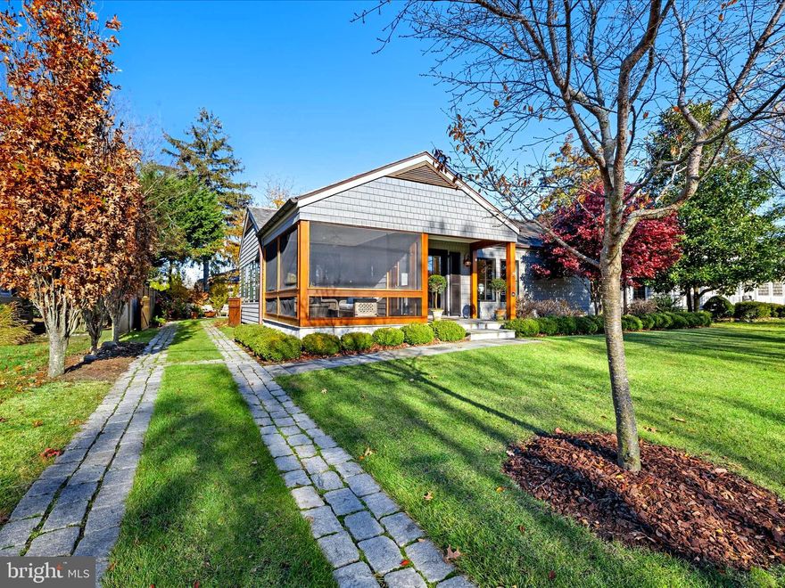 This boutique, coastal-chic residence, affectionately named "Cedar House" is the crafted outcome of a  2017 complete architectural reinvention from its original bones to its beautifully finished form today. Positioned in a prized location just 5 blocks to the ocean and approximately 10 minute walk to Rehoboth Avenue in a quiet, residential tree lined neighborhood.
Inside, the home’s airy open floor plan lives spaciously within its 1,300 square feet, reflecting an unparalleled attention to authenticity and detail. Upon entering, you’re greeted by the warmth of wide-plank heart-pine floors, tongue-and-groove wood walls, and reclaimed hand-hewn oak beams—materials that lend character and texture befitting a quintessential beach home. The living room features a coffered ceiling and a 19th-century fireplace mantle, creating a bespoke focal point.
The custom kitchen was designed with no expense spared: Dramatic 3-inch profile Carrara marble countertops and full marble blackspash, custom cabinetry, and built-in Thermador stainless-steel appliances. A whimsical circular interior window provides a delightful connection to the sun-drenched sunroom along the home’s western side.
Two private primary bedrooms with en-suite baths complete the main level; one suite’s bath also functions conveniently as a powder room.
The exterior highlights old-world craftsmanship, including natural cedar shake siding and roofing, oversized copper gutters and downspouts, large Marvin casement windows, and custom wood doors. Mature and meticulously maintained landscaping frames the entire property—including formal boxwood hedging, hydrangeas, magnolia and a raised-bed garden—while an authentic Belgian block driveway winds back to a distinguished carriage house garage. (Professionally designed renderings for a carriage house conversion with pool & gas fire pit addition are available from the seller.)
A perfect offering for the discerning, design-minded buyer, this residence stands apart from other homes available at this price point for its uncompromising craftsmanship, curated materials, refined coastal aesthetic, and highly coveted in-town Rehoboth Beach location. *NOTE: Property has dedicated well for lawn/ garden irrigation and electric car charger. *ALSO: Just over 1 block to the much loved local footbridge "Turtle Bridge" that traverses Silver Lake and short walk to the beach. (*Public designated pickleball & tennis courts just a block away, as well.)