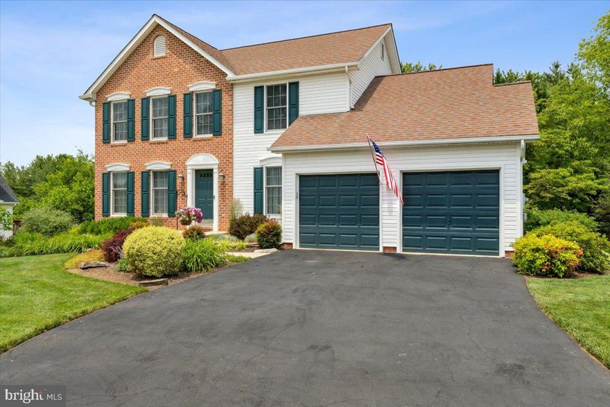 Welcome to this meticulously maintained colonial home in sought after Middletown where quality craftsmanship meets modern comfort. This 4-bedroom, 2/2-bath beauty offers an open layout and an abundance of natural light. The living room features a gas fireplace with custom built-ins and flows seamlessly into a gourmet kitchen with granite countertops, custom cabinets, and a large island. Enjoy meals in the adjoining dining area or step outside to a beautifully landscaped backyard with a custom patio, maintenance free deck, and floodlights—perfect for relaxing or entertaining. The luxurious primary suite boasts a spa-like bath and custom walk-in closet, while three additional bedrooms and upgraded bathrooms complete the upper level. Crown molding and custom window coverings add elegance throughout. The finished basement includes a den with cable hookup, a custom granite-topped bar with fridge, a bonus room for office or storage, and an additional room that could serve as a bedroom. A half bath adds convenience for guests or extended living. Additional highlights: Anderson windows, 1-year-old hot water heater, and approx. 10-year-old roof. This stunning home blends style, space, and functionality—welcome home!